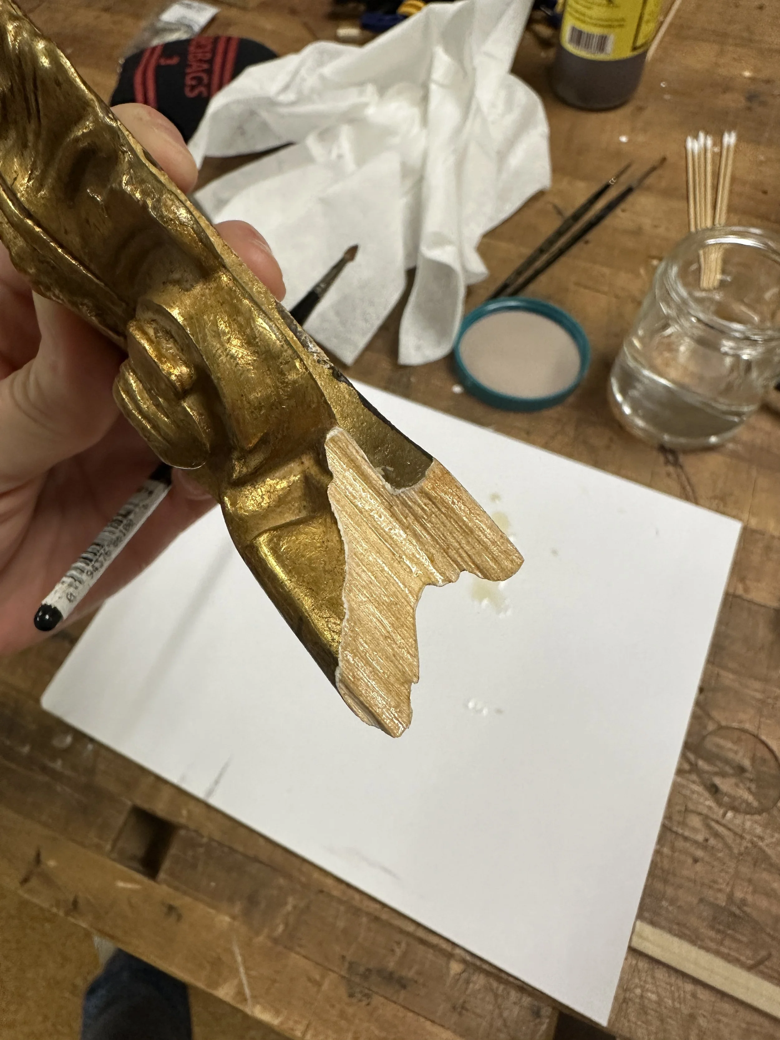 Sizing the porous wood in the break with hide glue. (Photo: Jennifer Kim)