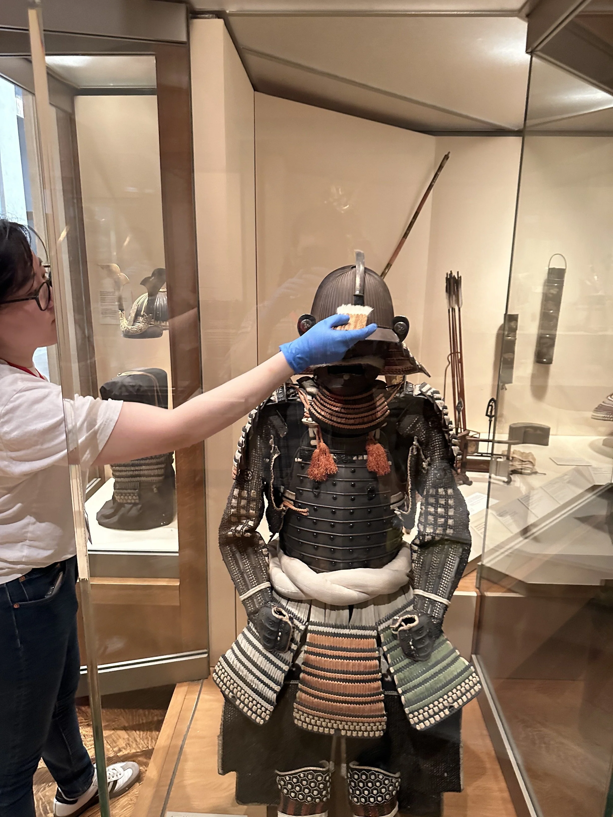 Dusting Japanese armor. (Photo: Sean Belair)