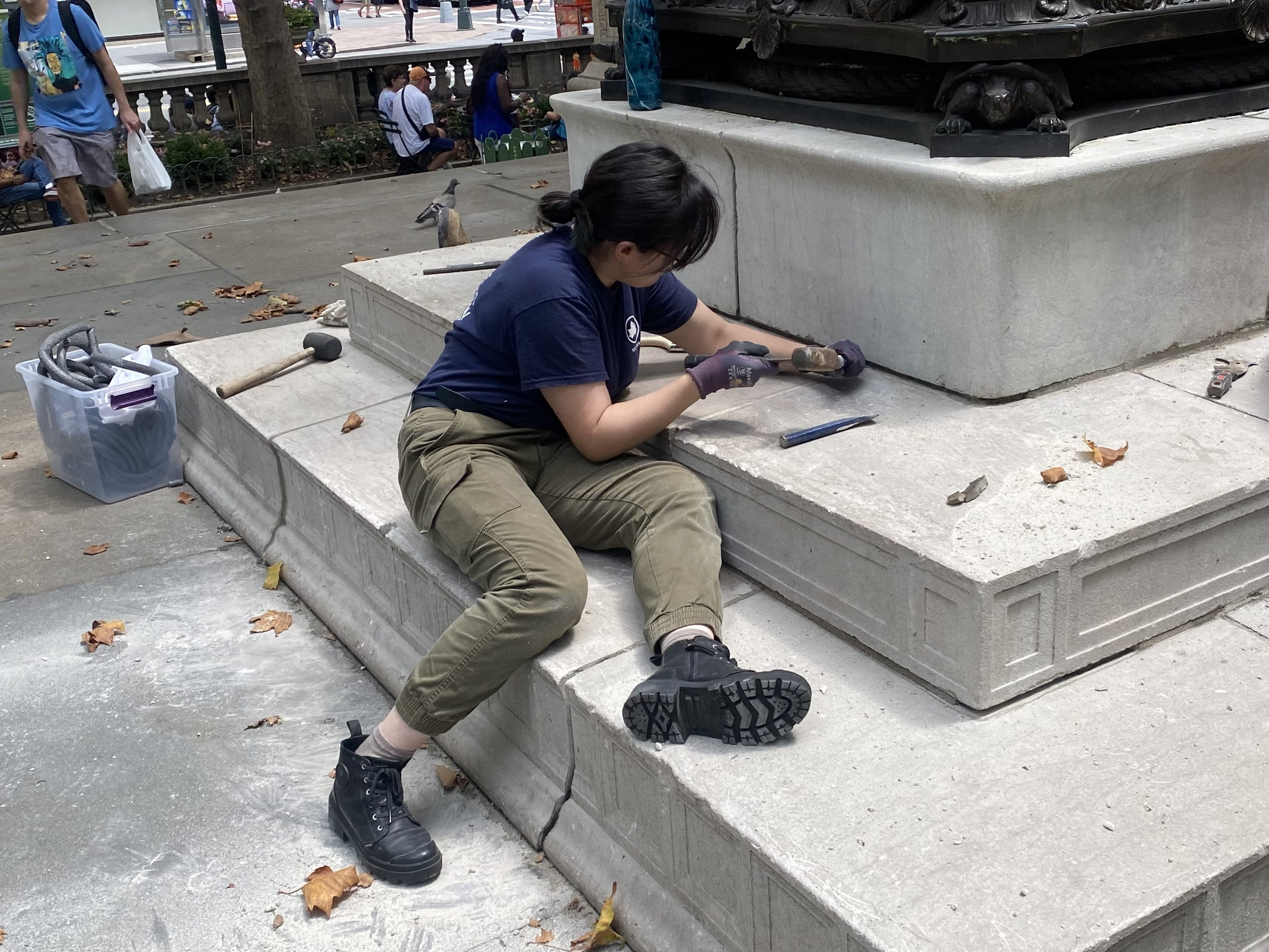 Repointing a flagstaff base on the front plaza of the New York Public Library Stephen A. Schwartzman Building. (Photo: Julia Pagnamenta)