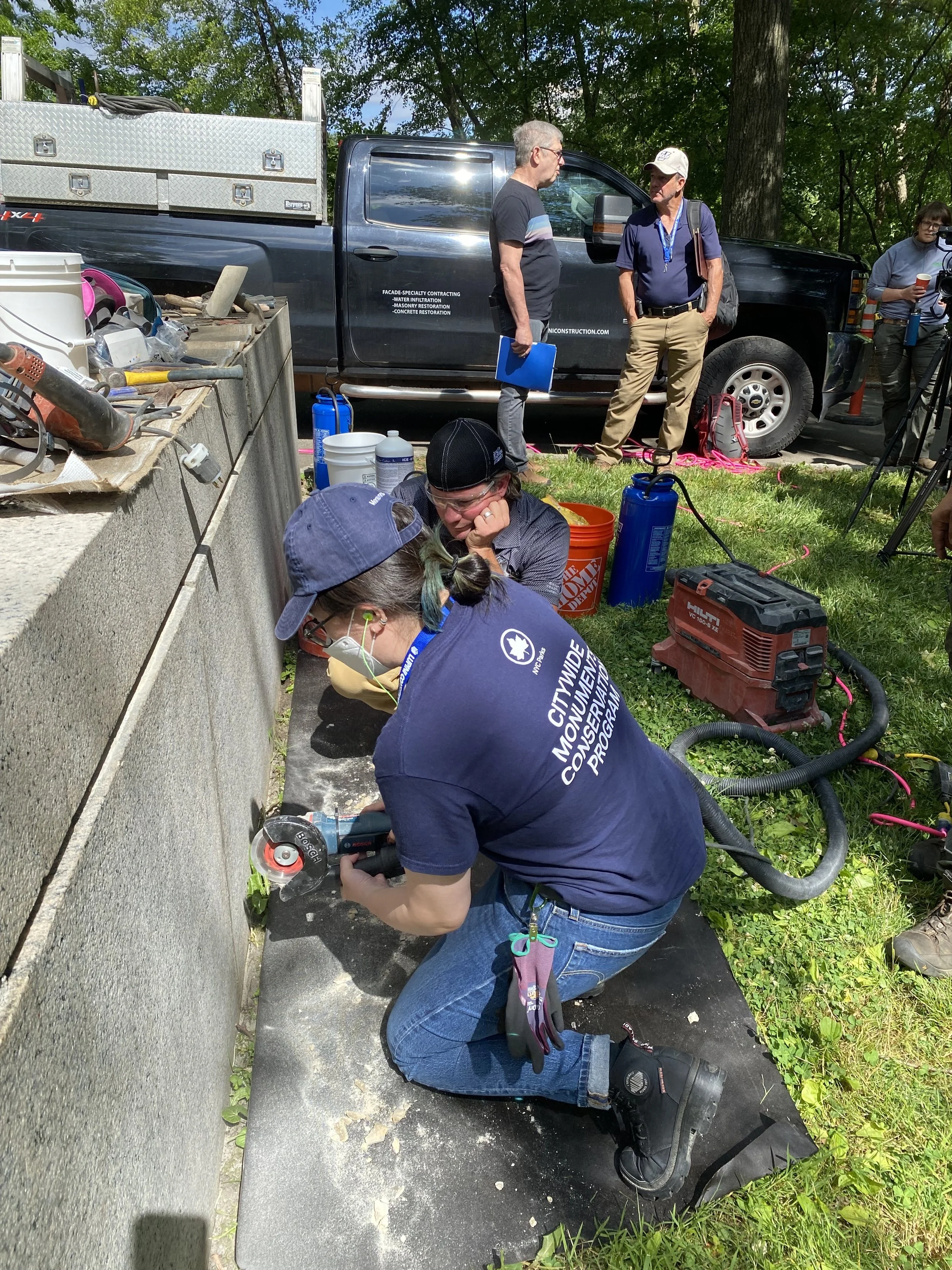 Learning how to use the circular saw. (Photo: NYC Parks)