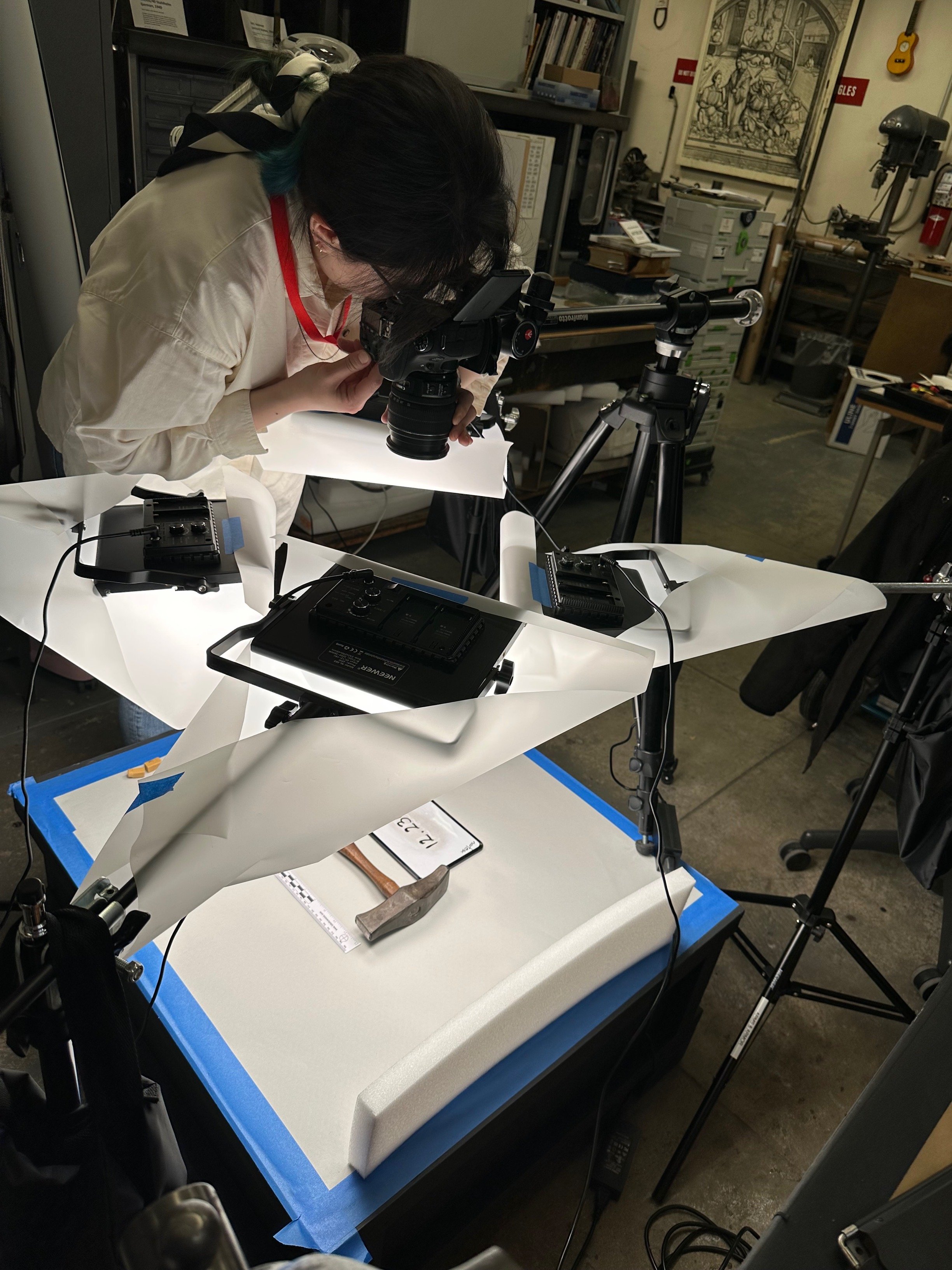 Photographing hammers in the lab with an improvised photo studio. (Photo: Sean Belair)