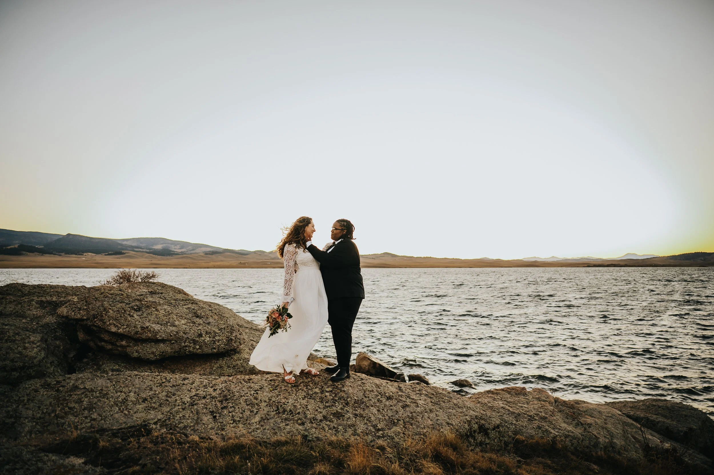 Two brides getting ready together before their self-solemnizing ceremony.