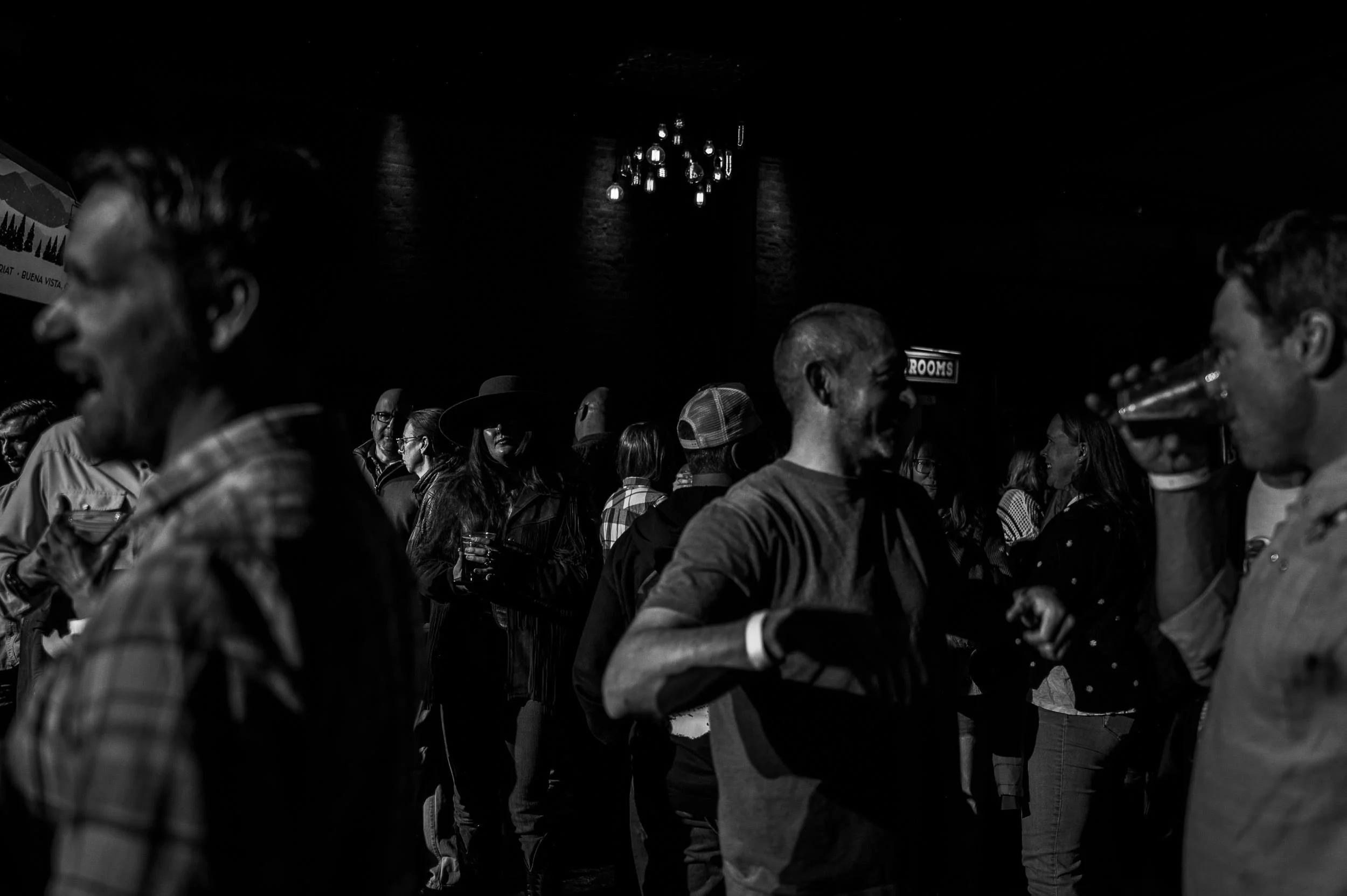 Audience listening closely to John Craigie during his performance at The Lariat.