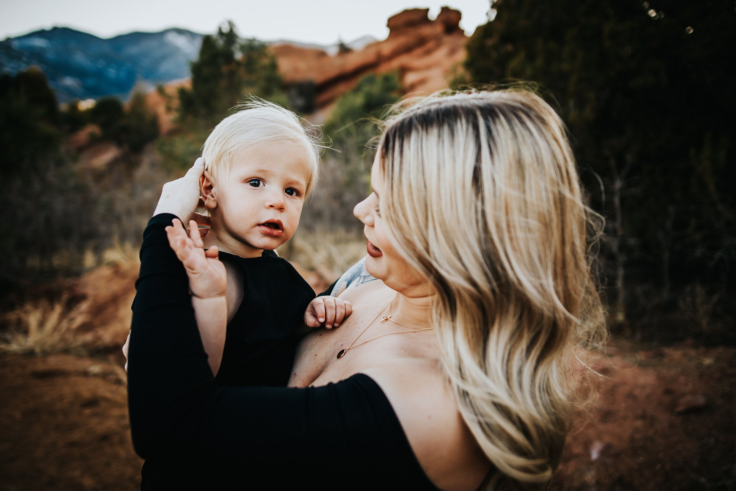 Kaitlyn Petersen Maternity Sesson Colorado Springs Sunset Pikes Peak Wild Prairie Photography-9-2021.jpg