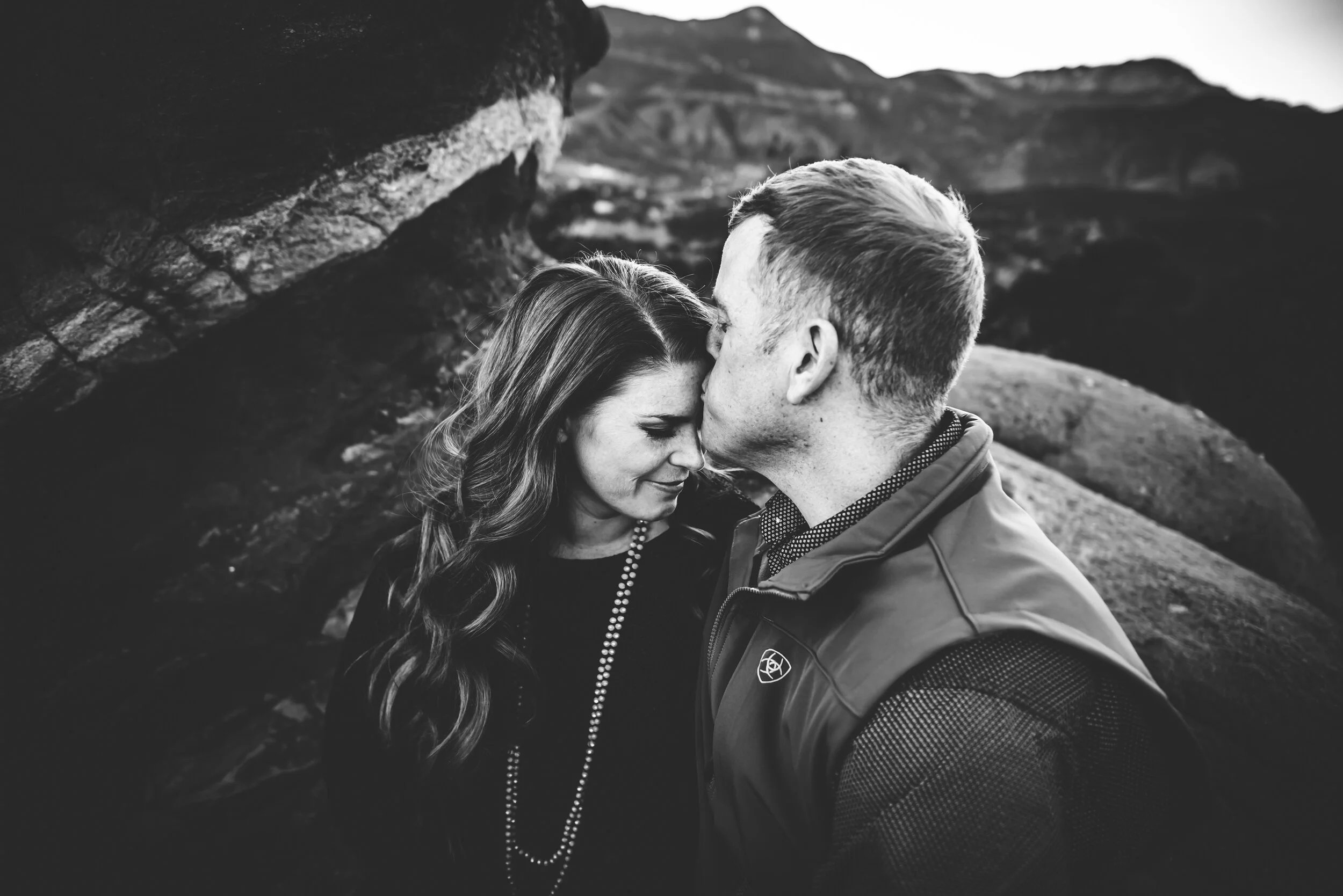Couple embracing at Garden of the Gods during marriage celebration session