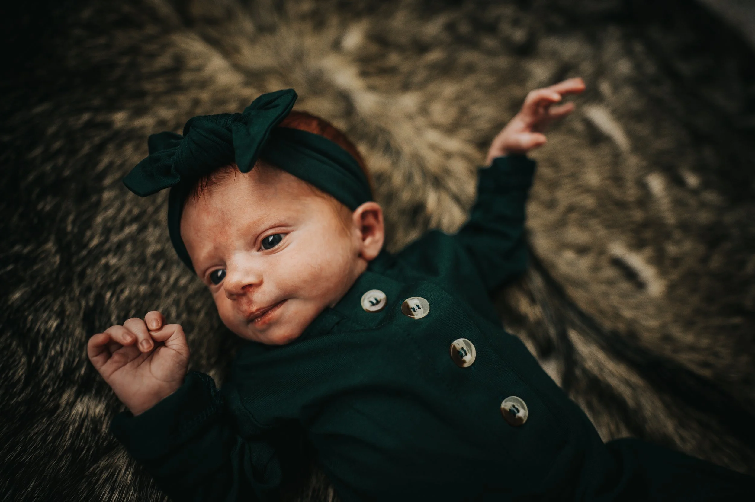 Newborn baby details captured during in-home lifestyle session.