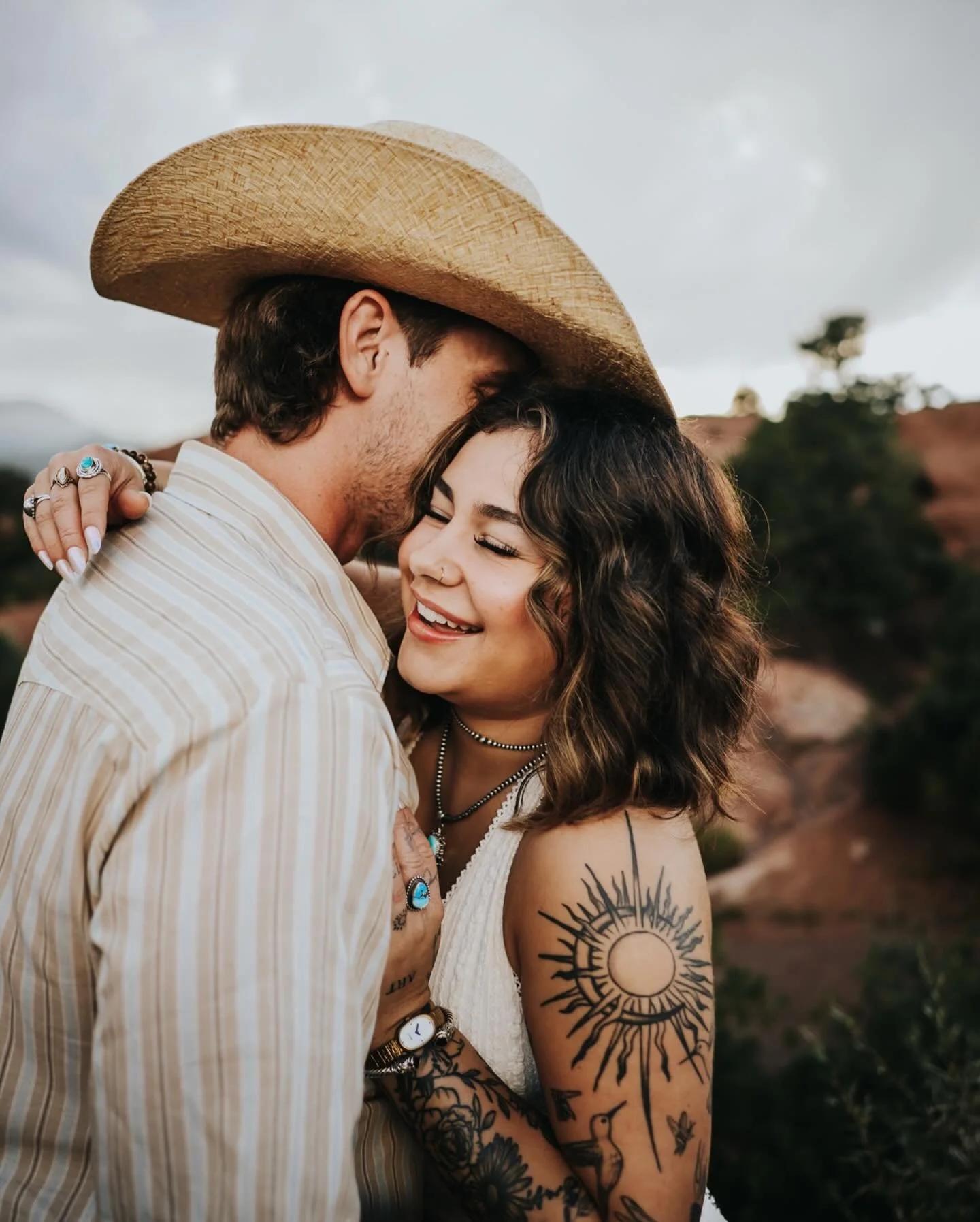 Golden hour wrapped the rocks in firelight, the storm clouds broke just enough for the sky to soften, and Cade finally reached for the ring he&rsquo;d been holding close all evening.

Nicky&rsquo;s joy spilled out like the sun itself, laughter throug