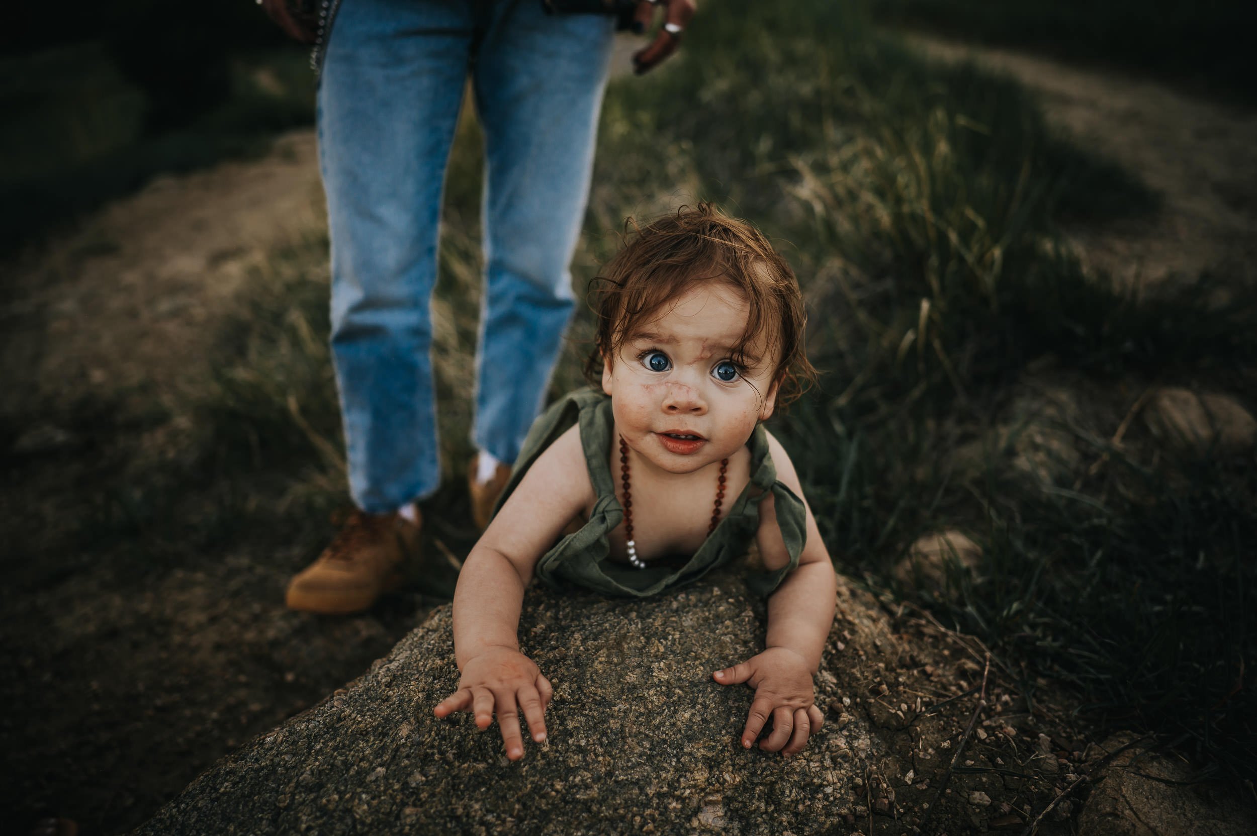 Outdoor family photography session focused on movement, play, and connection