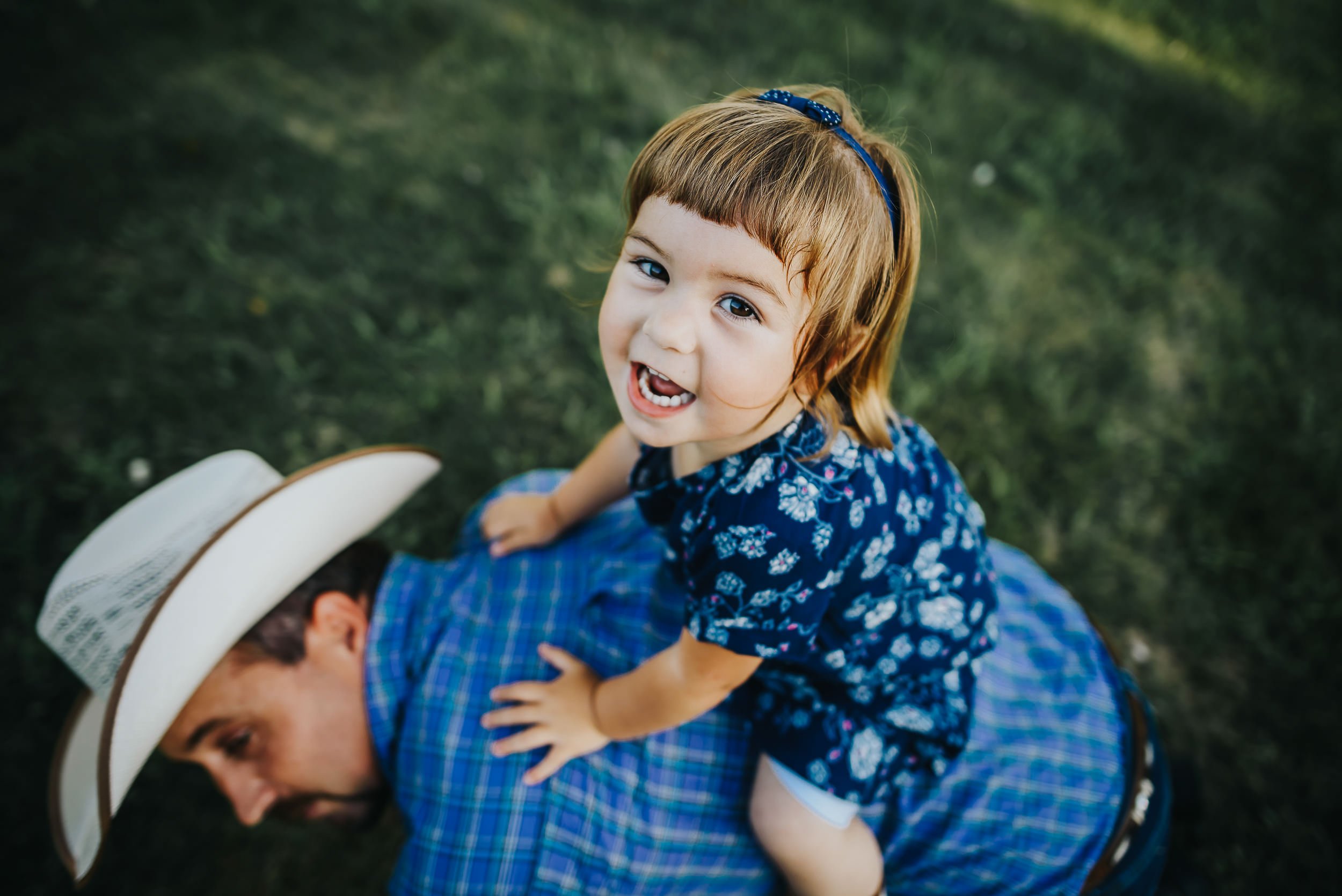 little-girl-laughing-blue-clothing.jpg