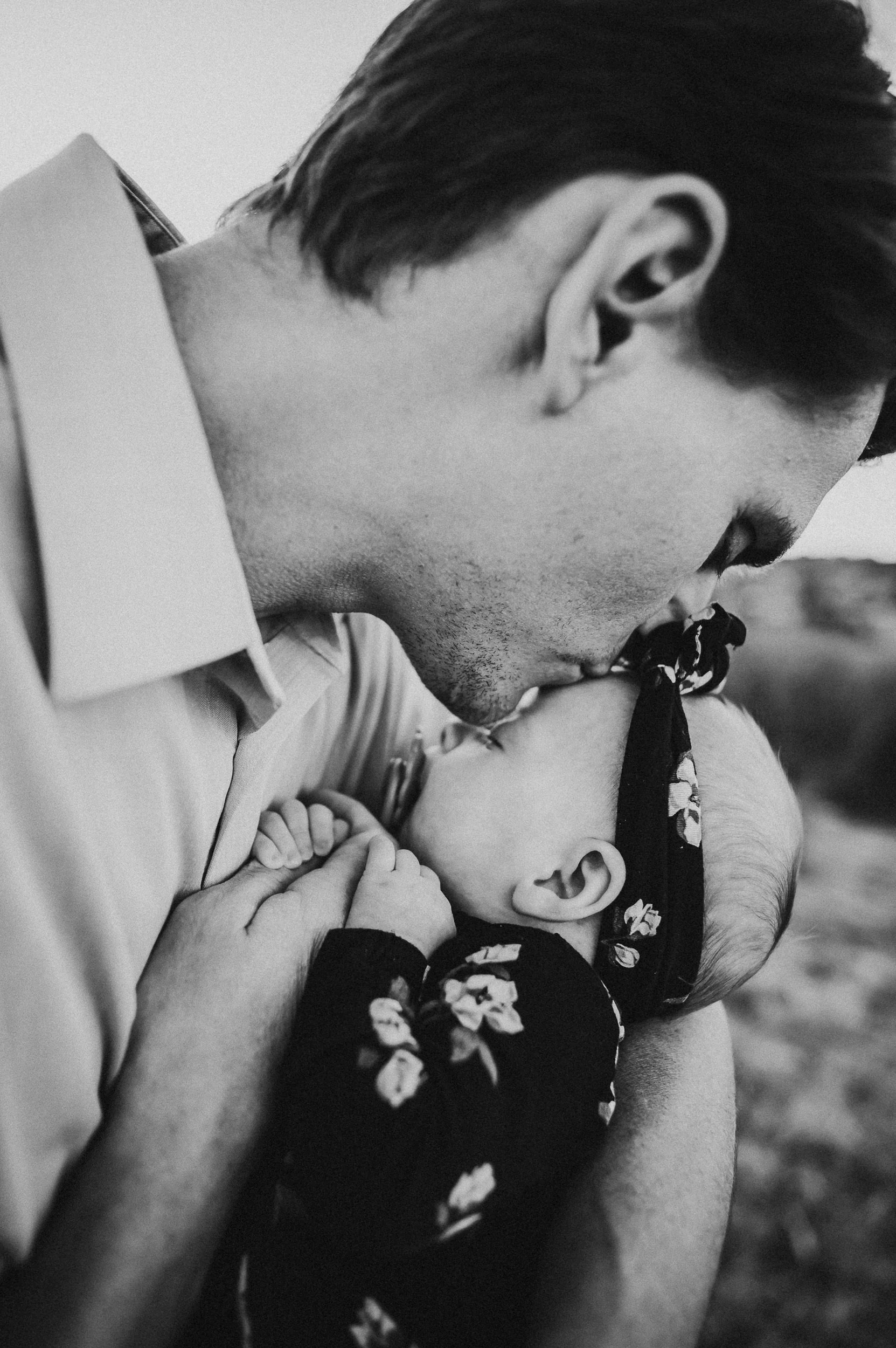 Family with newborn baby Marina at Ute Valley Park with soft evening light.