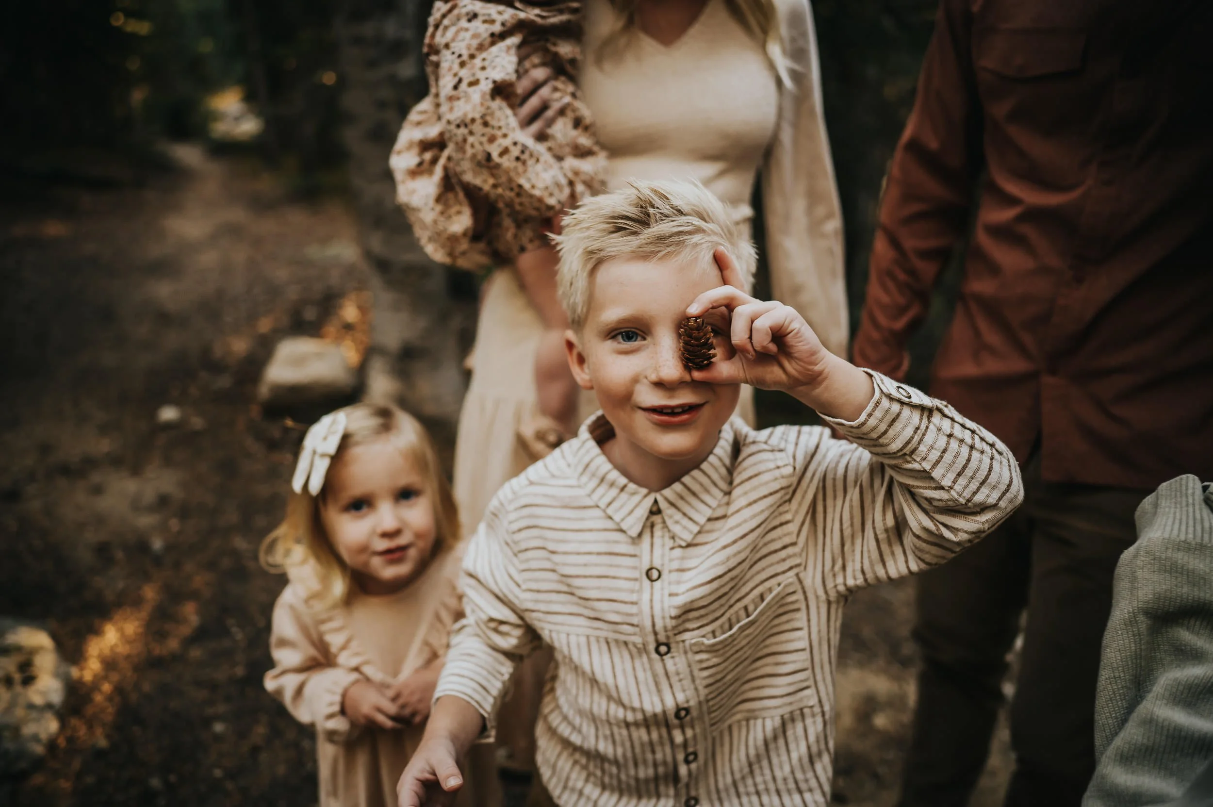 Close family connection captured during a golden hour family session at Brainard Lake.