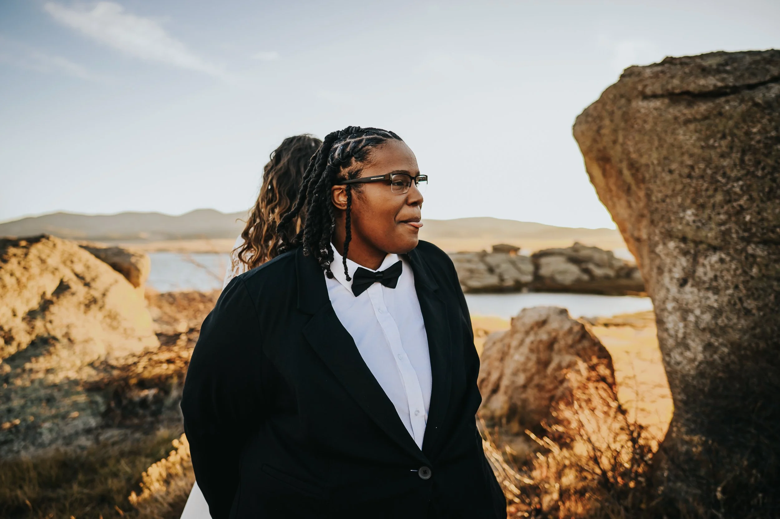 Portrait of married couple bathed in the last light of golden hour.