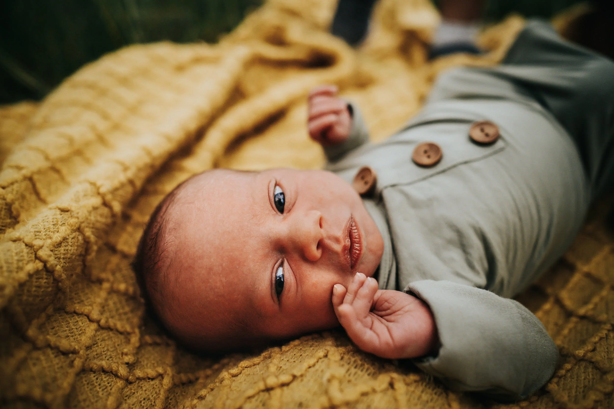newborn-yellow-blanket-closeup.jpg
