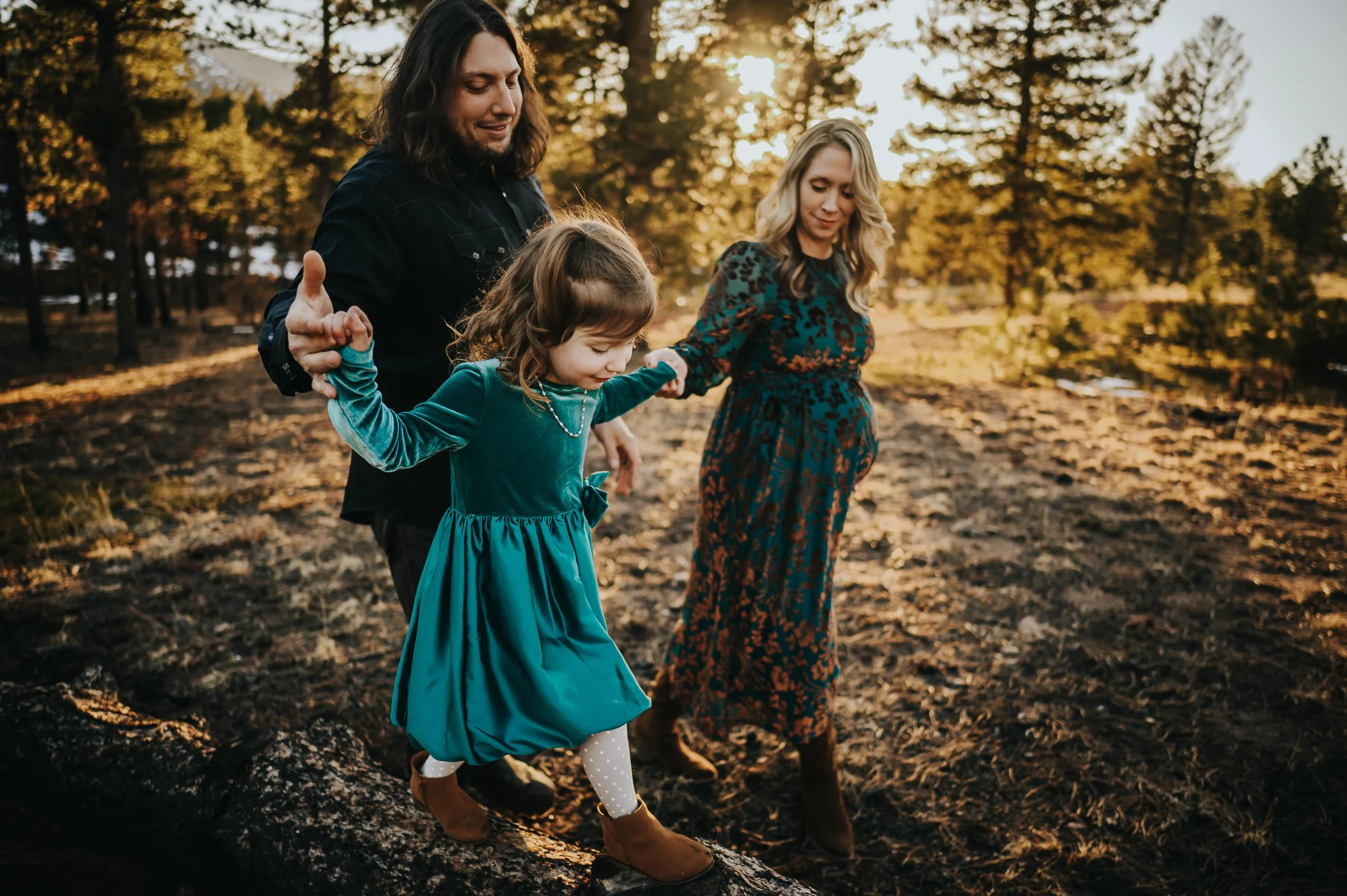 Family maternity photos taken in the mountains of Colorado
