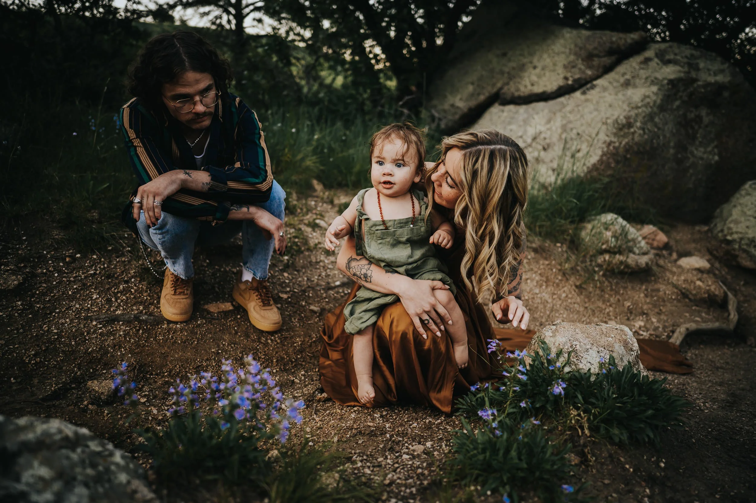 Playful family interacting together during an outdoor photo session in Colorado Spring