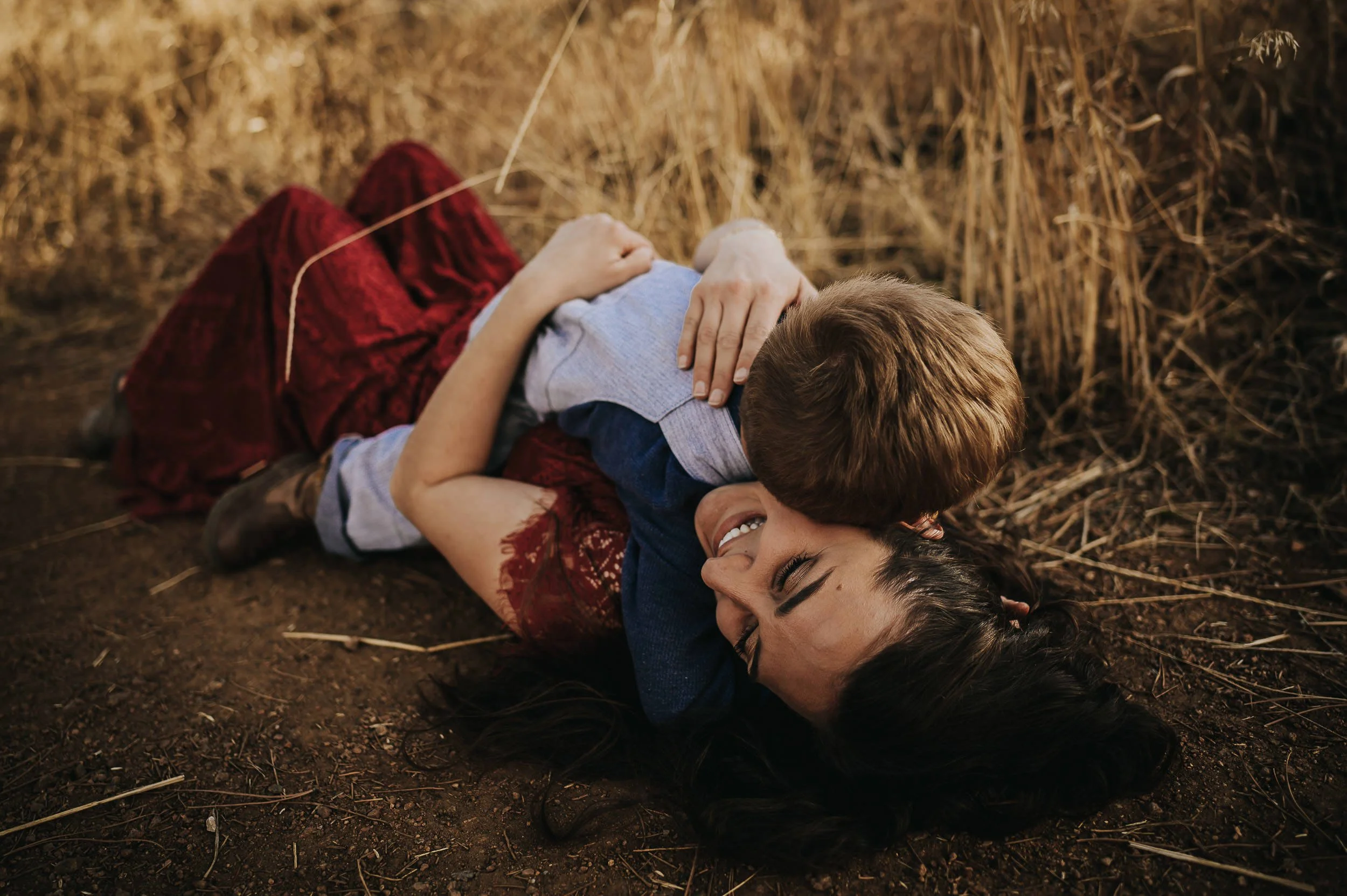 mom-son-snuggle-on-ground-cheyenne-canyon.jpg