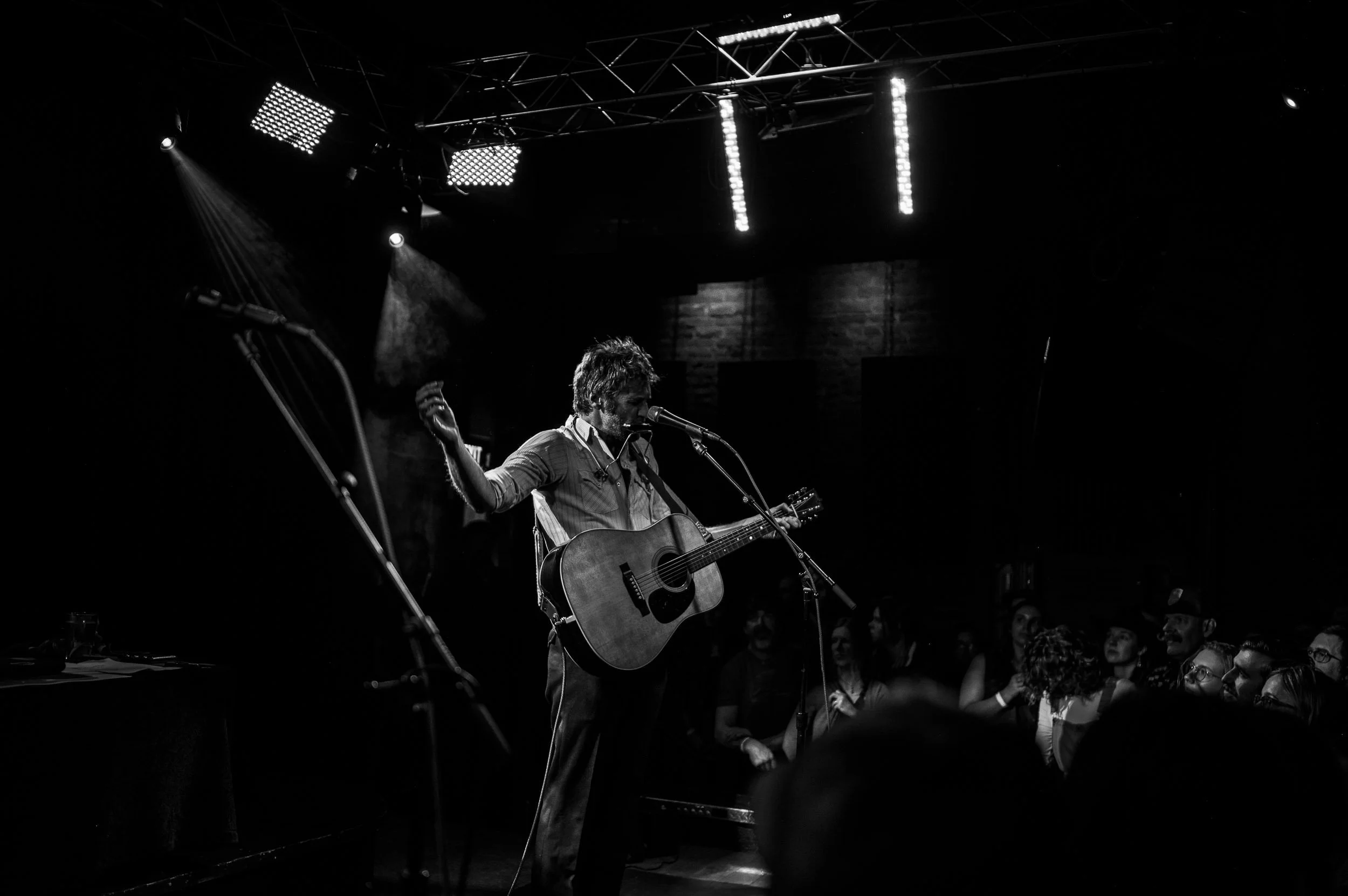 Moody concert atmosphere during John Craigie’s live show in Buena Vista, Colorado.