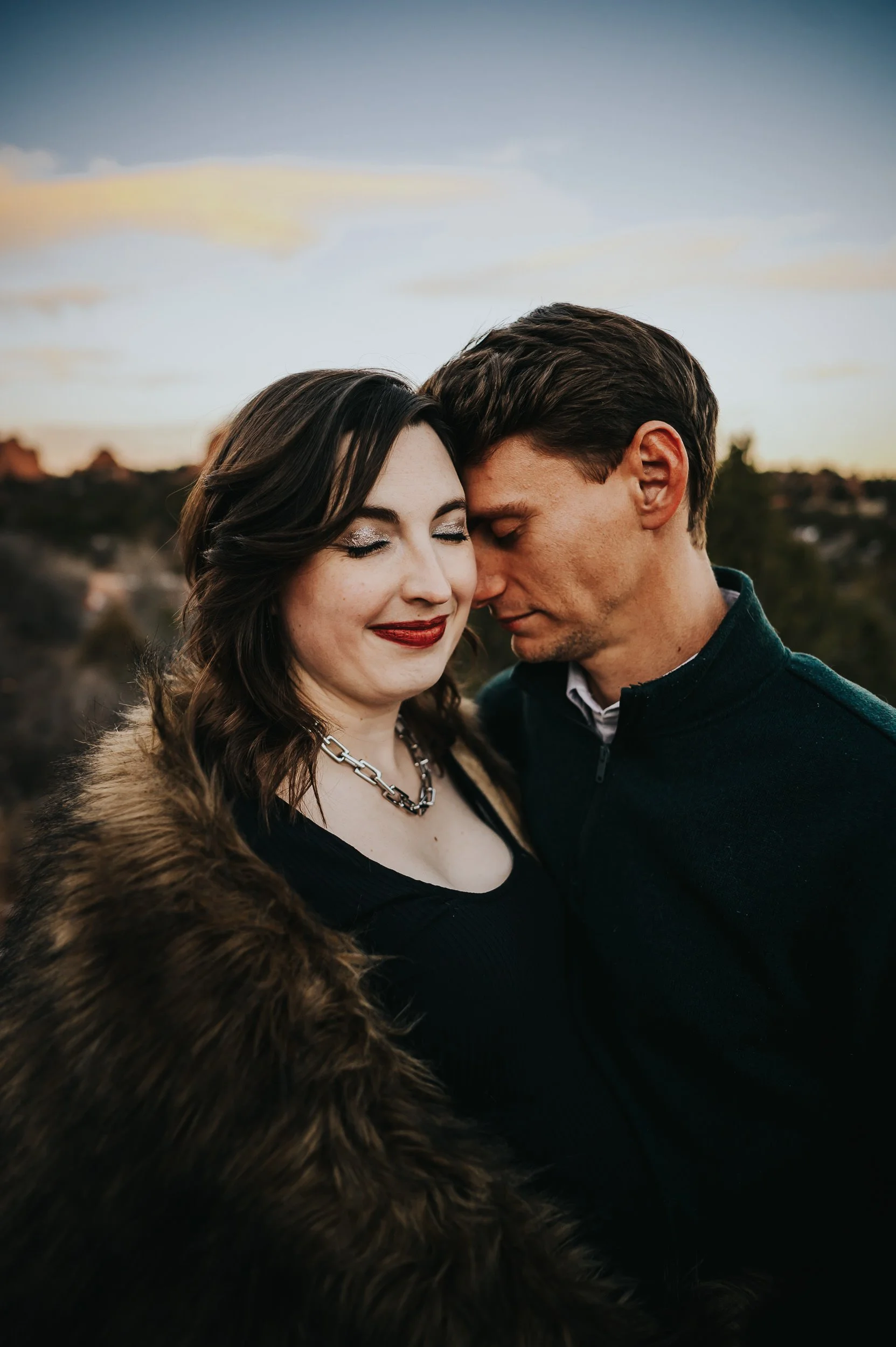 Couple during golden hour maternity session at Garden of the Gods in Colorado Springs.