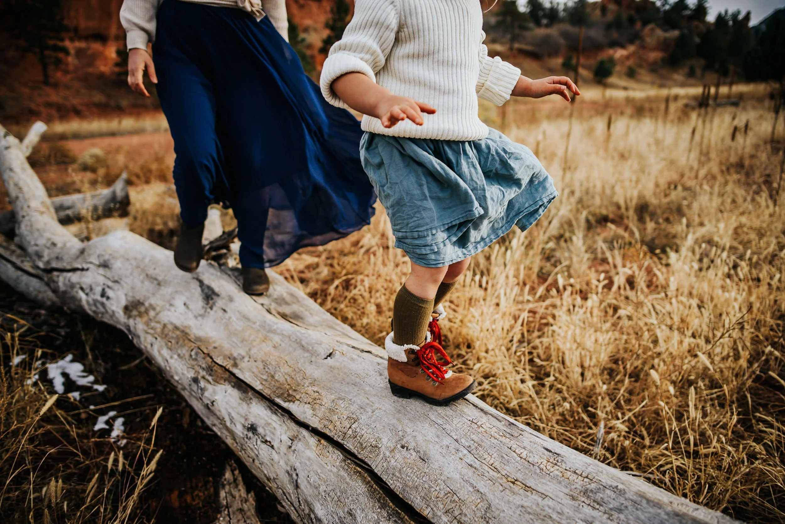 girl-and-mom-explore-drift-wood.jpg