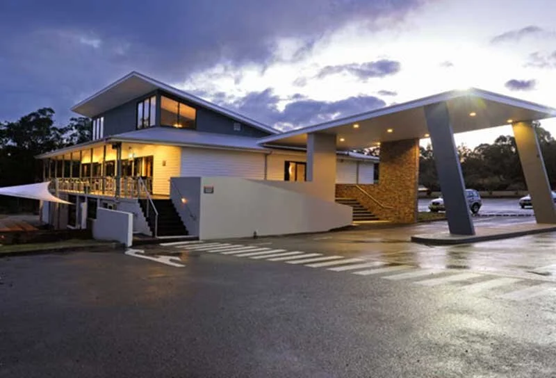 Country club with disability access stairs and ramps