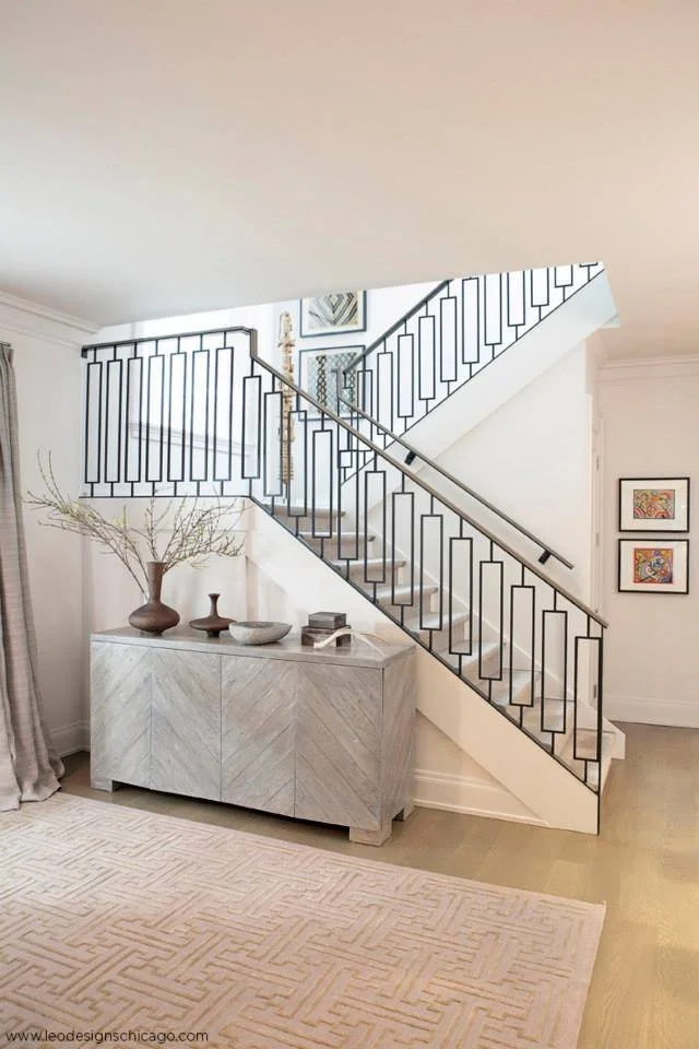 A glimpse of this contemporary stairway from a distance. Interiors by Leo Designs Ltd.