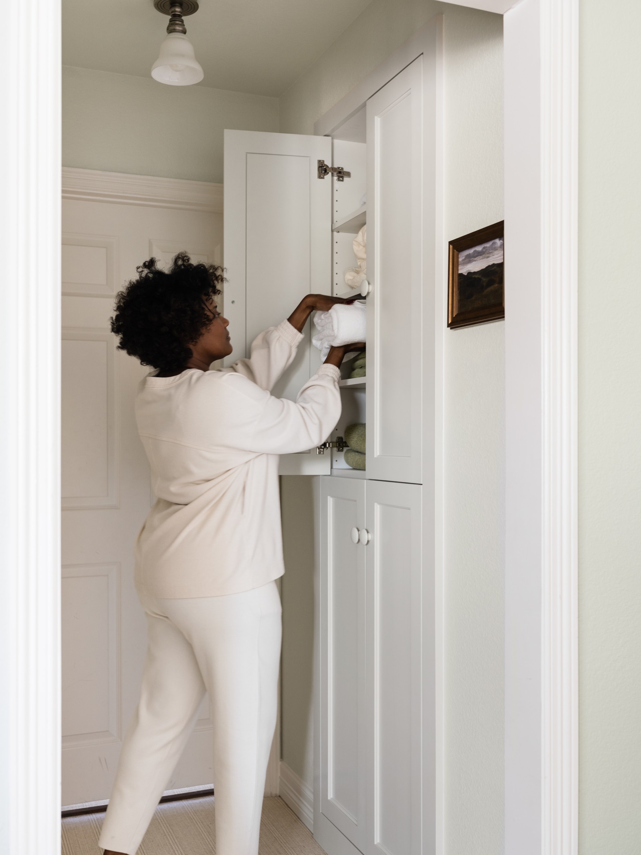 Hospitality lives in the details no one asks about.
This hallway isn&rsquo;t a destination. It&rsquo;s a pass-through most guests won&rsquo;t linger in. But open the cabinet and you&rsquo;ll find it stocked with the same care as any room built to be 