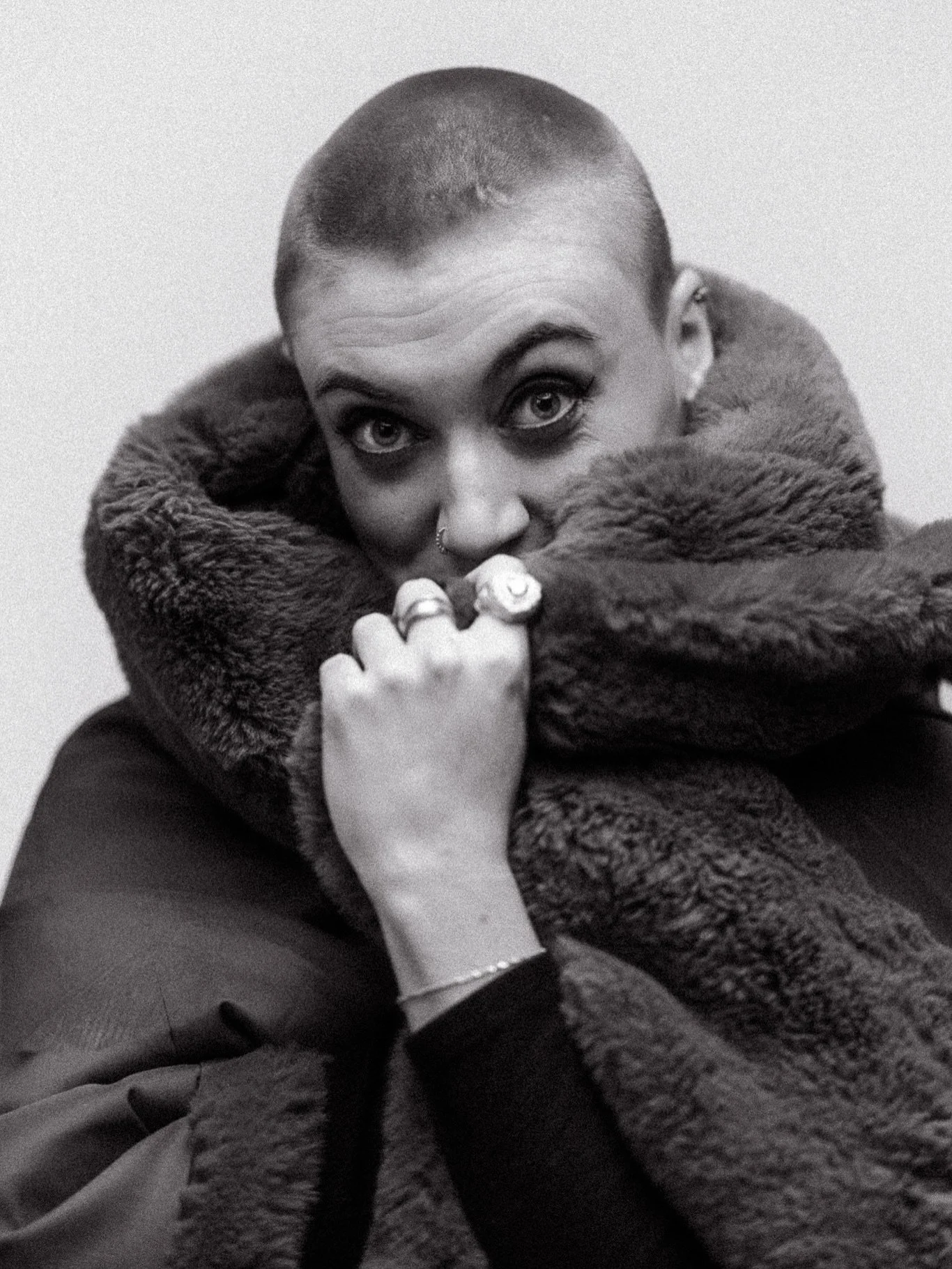 Beth, trying to put a coat on.

@beff57