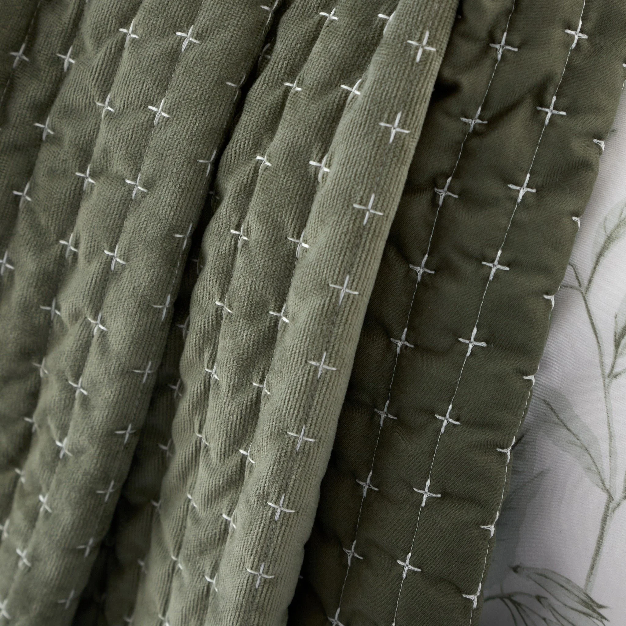 Timeless elegance meets effortless comfort 
Our beautifully crafted bedspread adds a luxurious layer to your bedroom, featuring a sumptuously soft texture and intricate embroidered detailing. Lightly quilted for a touch of warmth and sophistication, 