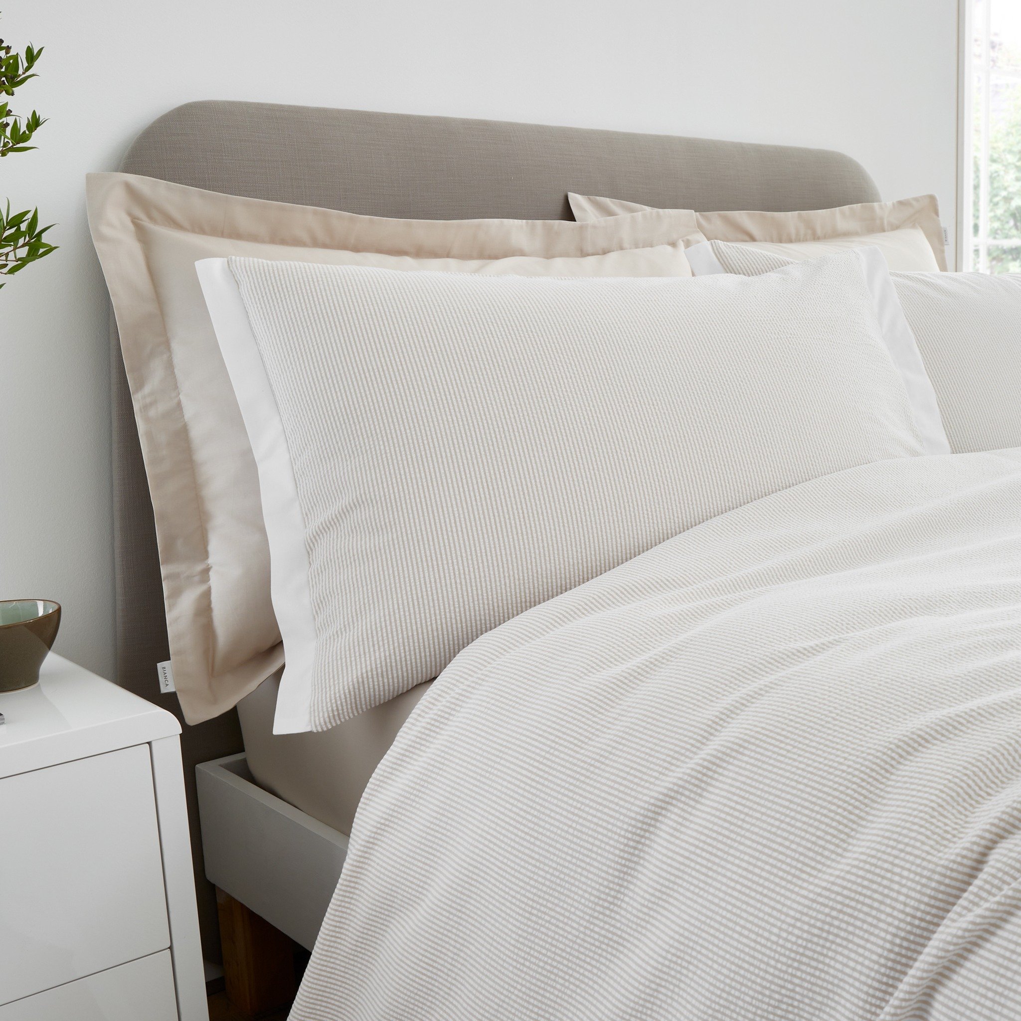 Create a calm, contemporary retreat with this textured seersucker duvet set, finished in breathable 200 thread count percale cotton for beautifully soft, laid back comfort.

#BedroomSanctuary #SeersuckerStyle #PercaleCotton #SleepInComfort #Contempor