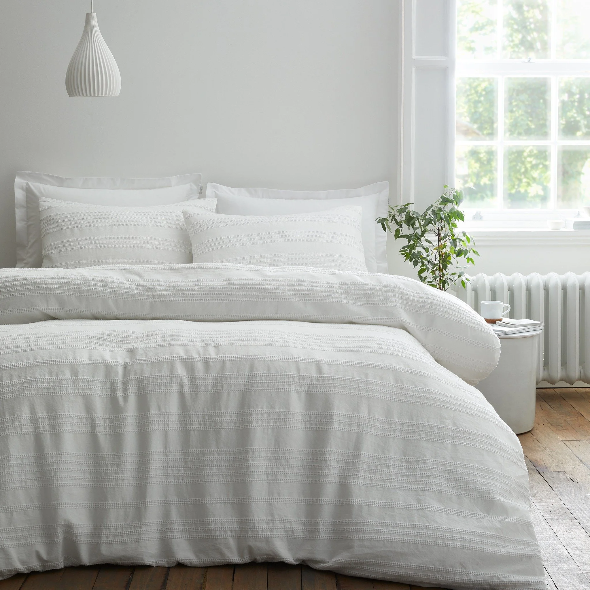 Understated elegance meets everyday comfort with this timeless white design, crafted from beautifully soft washed cotton with a subtle woven stripe for a relaxed, refined finish.

#BiancaFineLinens #BiancaHome #LuxuryBedding #WashedCotton #BedroomEle