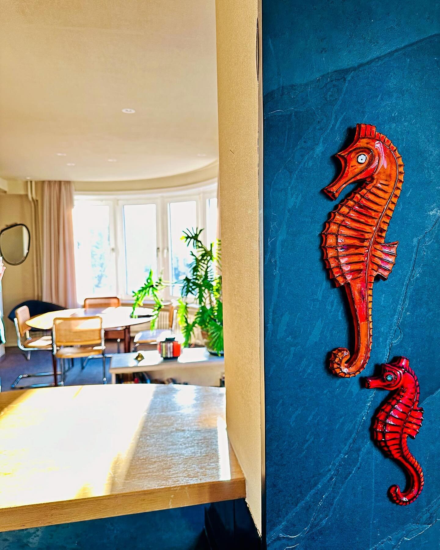 These two eclectic seahorses from Andr&eacute; Bayer (1906-1985) are watching over the @mariejose.oostende Residence. Bayer left the Paris region for 🇧🇪Belgium in the early 1930s. Bayer ceramics was a family business: his wife did the enamel work a