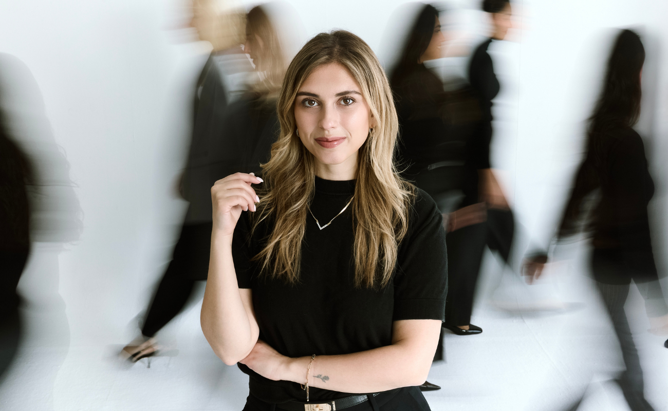 Image of Syndey, CEO of Pivota Marketing, and team in the background