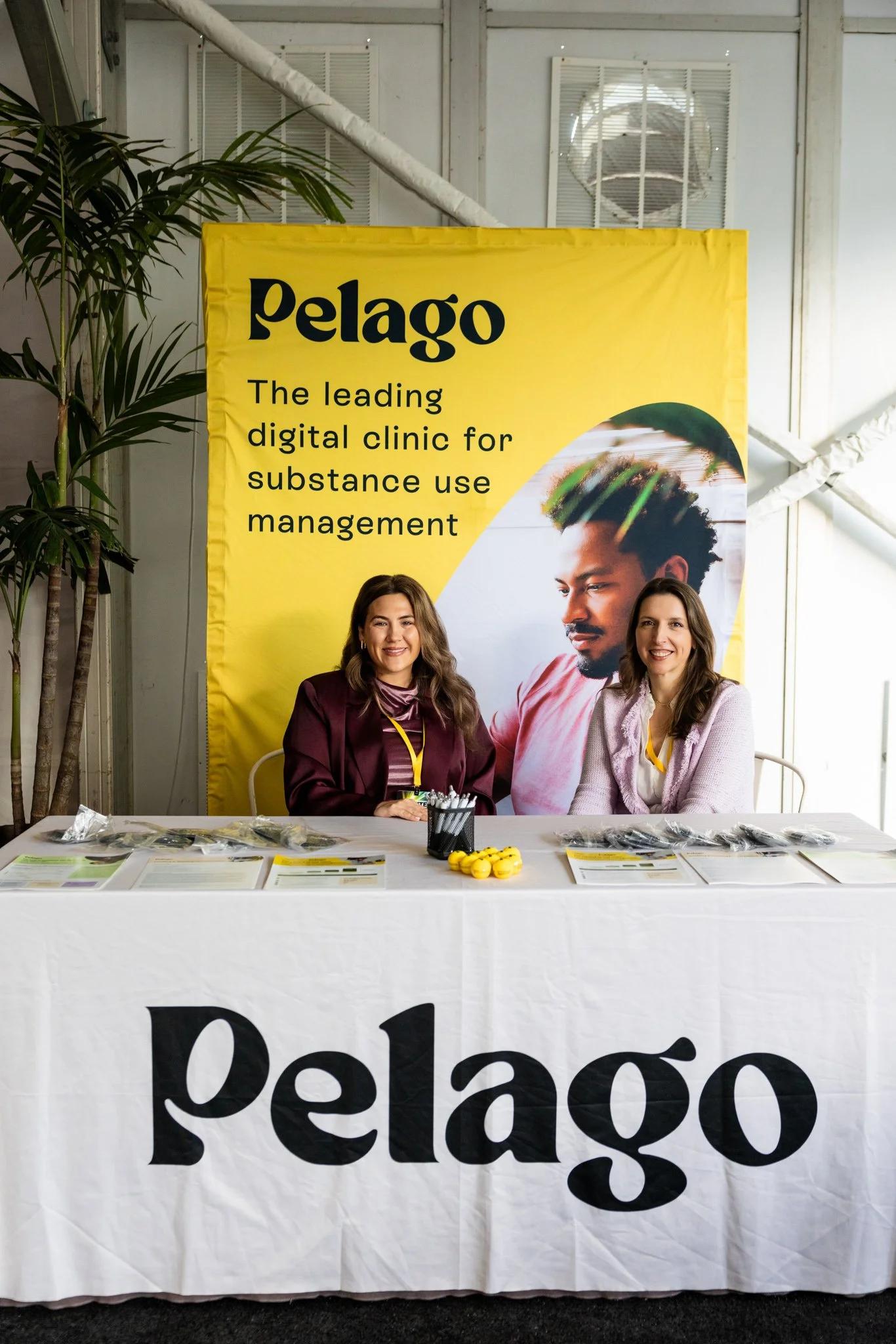 Vendor table for Pelago; vendor photography at corporate seminars