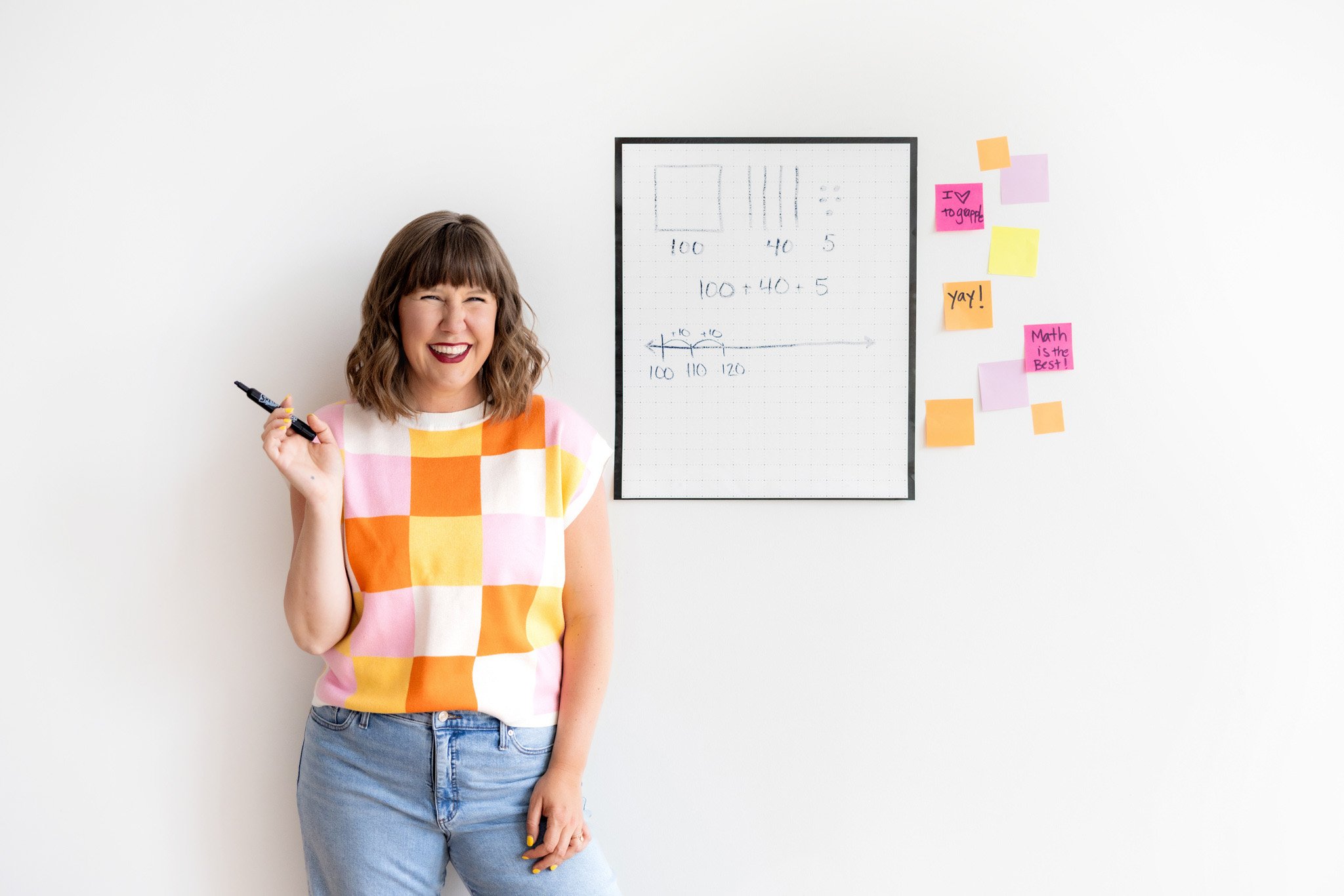 Personable headshot of a social media influencer in a colorful shirt