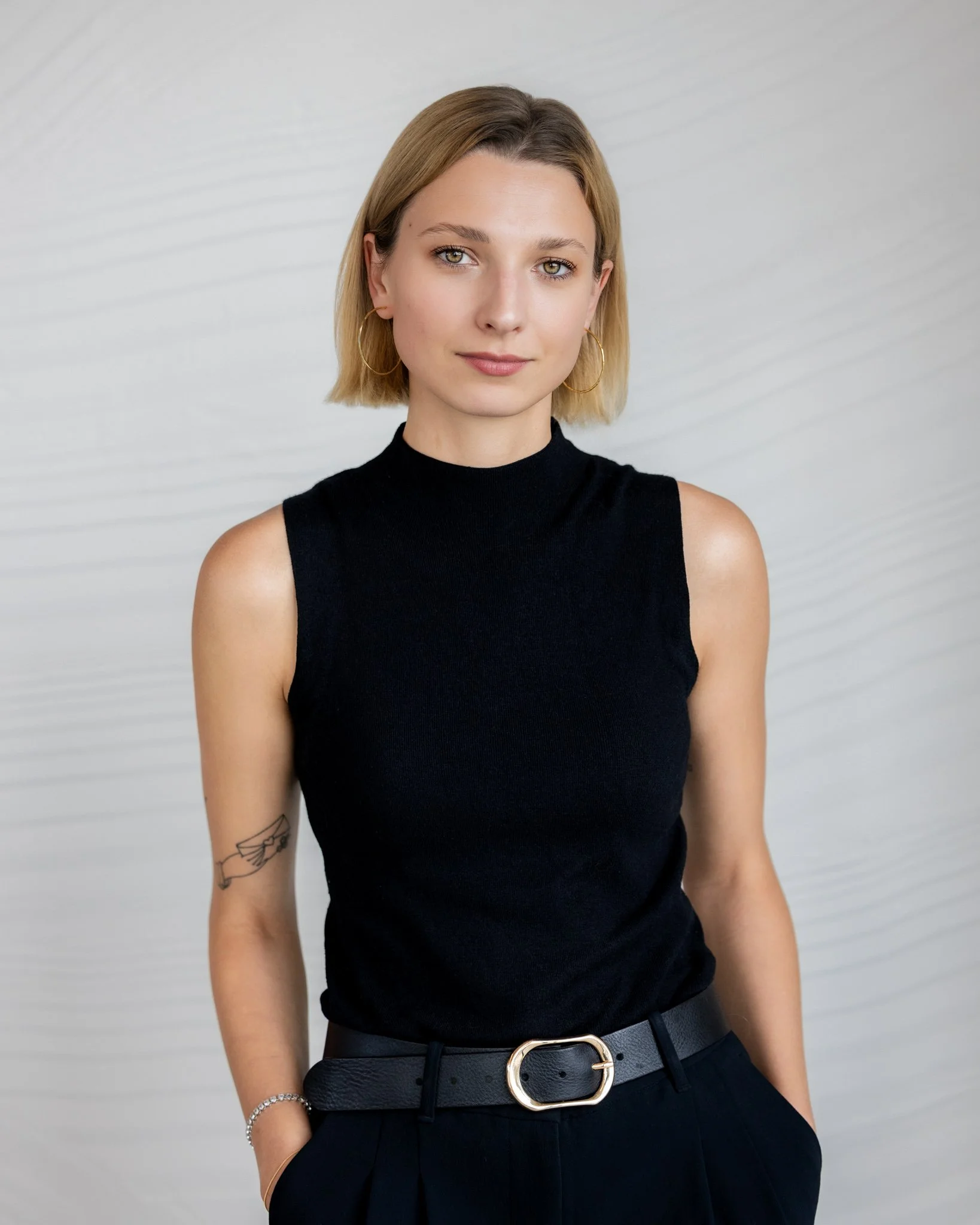 Simple, classic Chicago headshot of a woman in black clothing