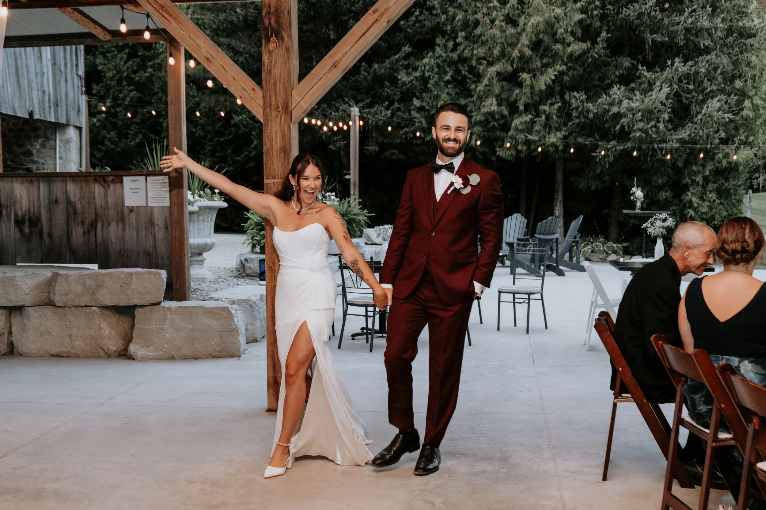 wedding couple entering reception at wedding venue cj country events