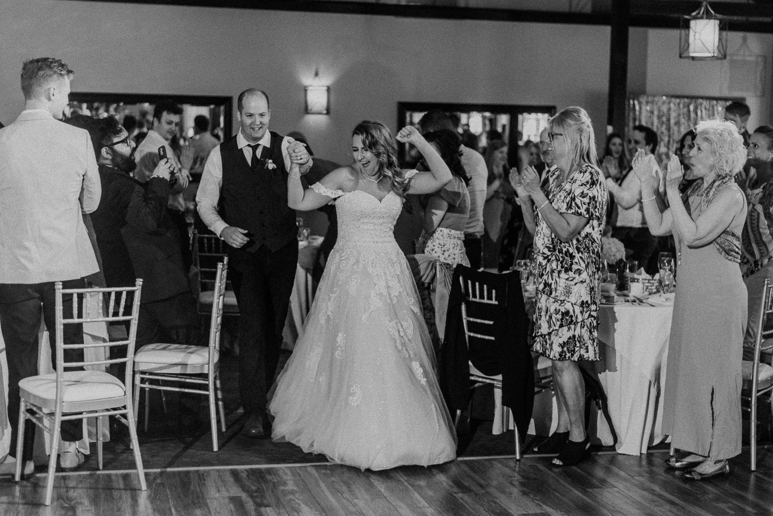 bride and groom grand entrance into wedding reception