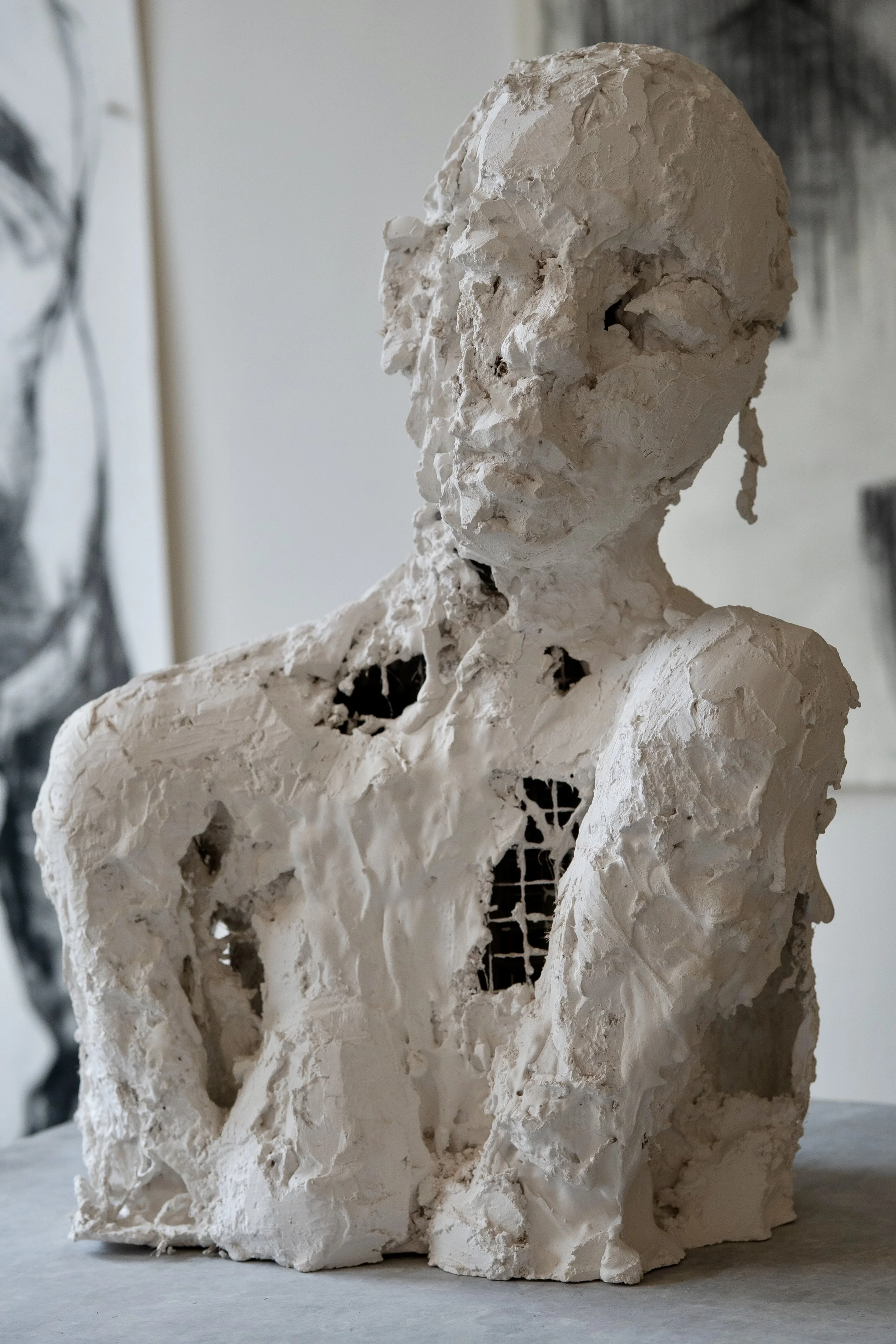 "Between the Shoulders" 2025, plaster, chicken wire and burlap, 7 x 16.5 x 11.5 inches