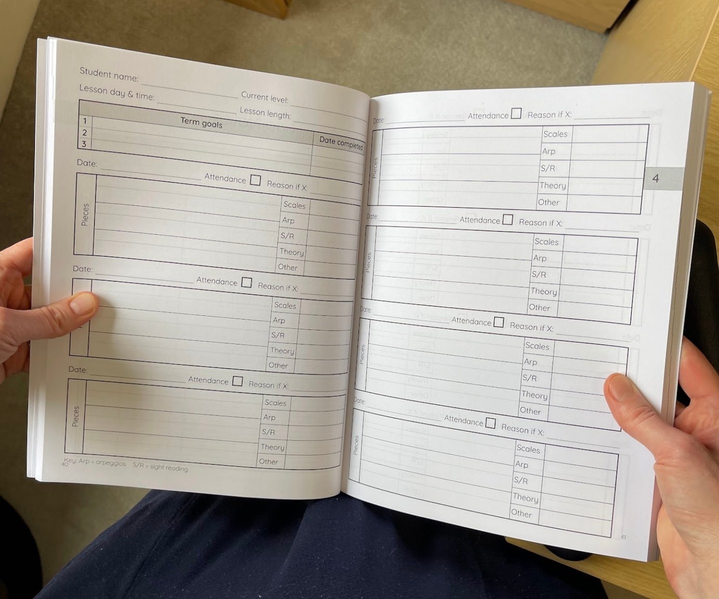 Open planner showing a double page spread of lesson notes pages