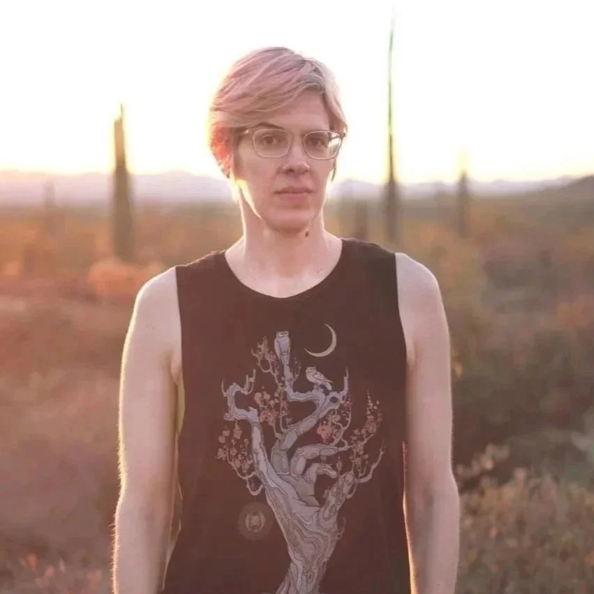 Person Wearing Tanktop and Glasses