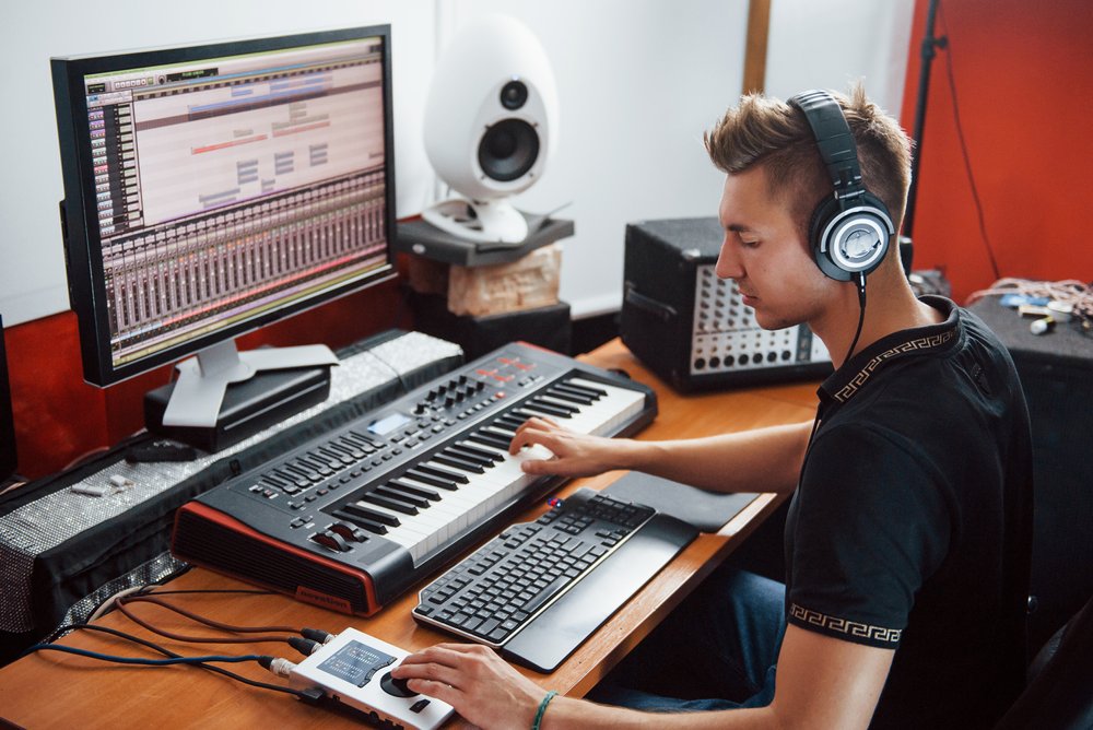 sound-engineer-in-headphones-working-and-mixing-mu-2022-02-01-22-38-34-utc.jpg