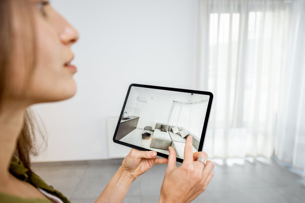 woman-using-augmented-reality-to-design-interior-2021-09-01-15-20-54-utc.jpg