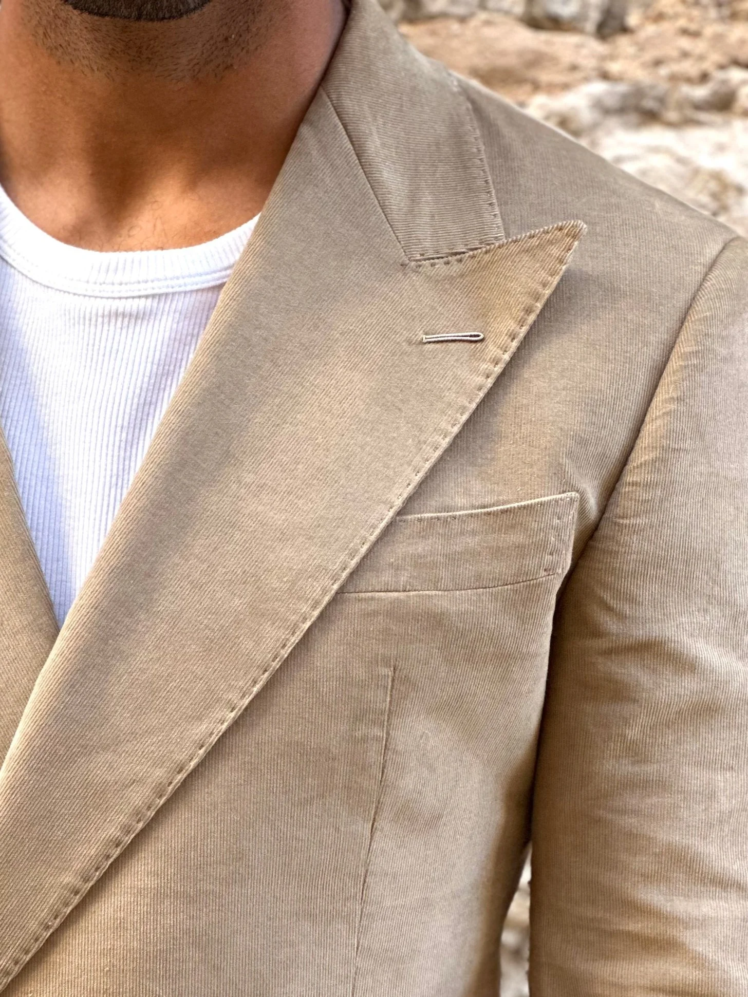 hand-stitched lapel buttonhole
