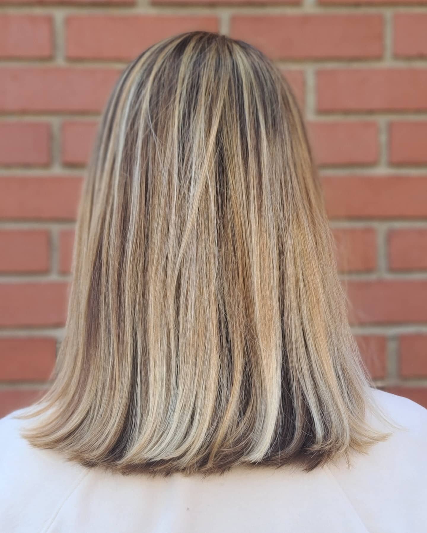 Balayage creates amazing dimension with minimal demarcation/grow out. 
Living in another city, this guest can't get in to my chair as often as we would always like. With sun-kissed, lived in balayage, you're able to wait a bit longer between appointm