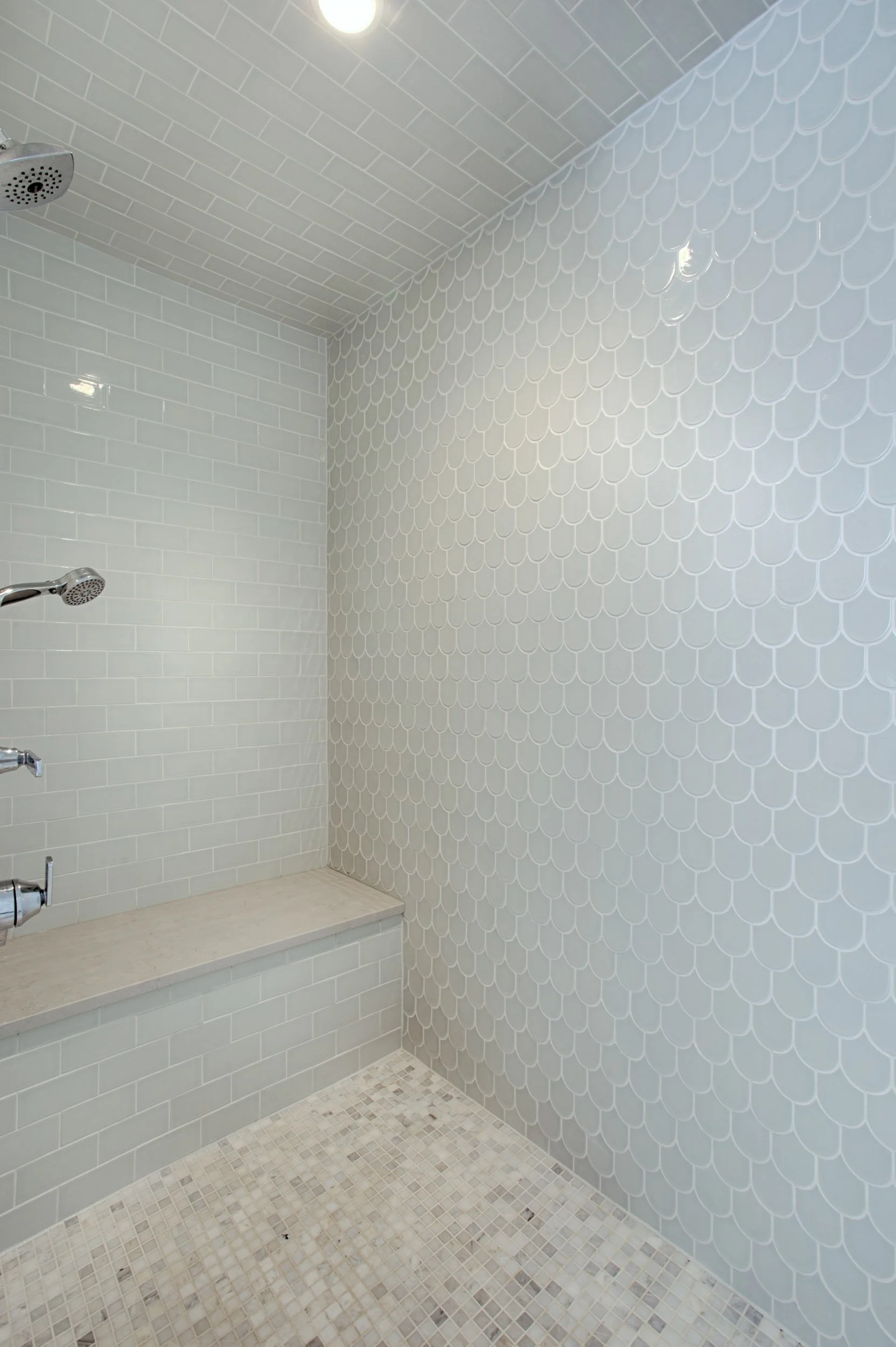  Custom tile for shower walls and floor. 