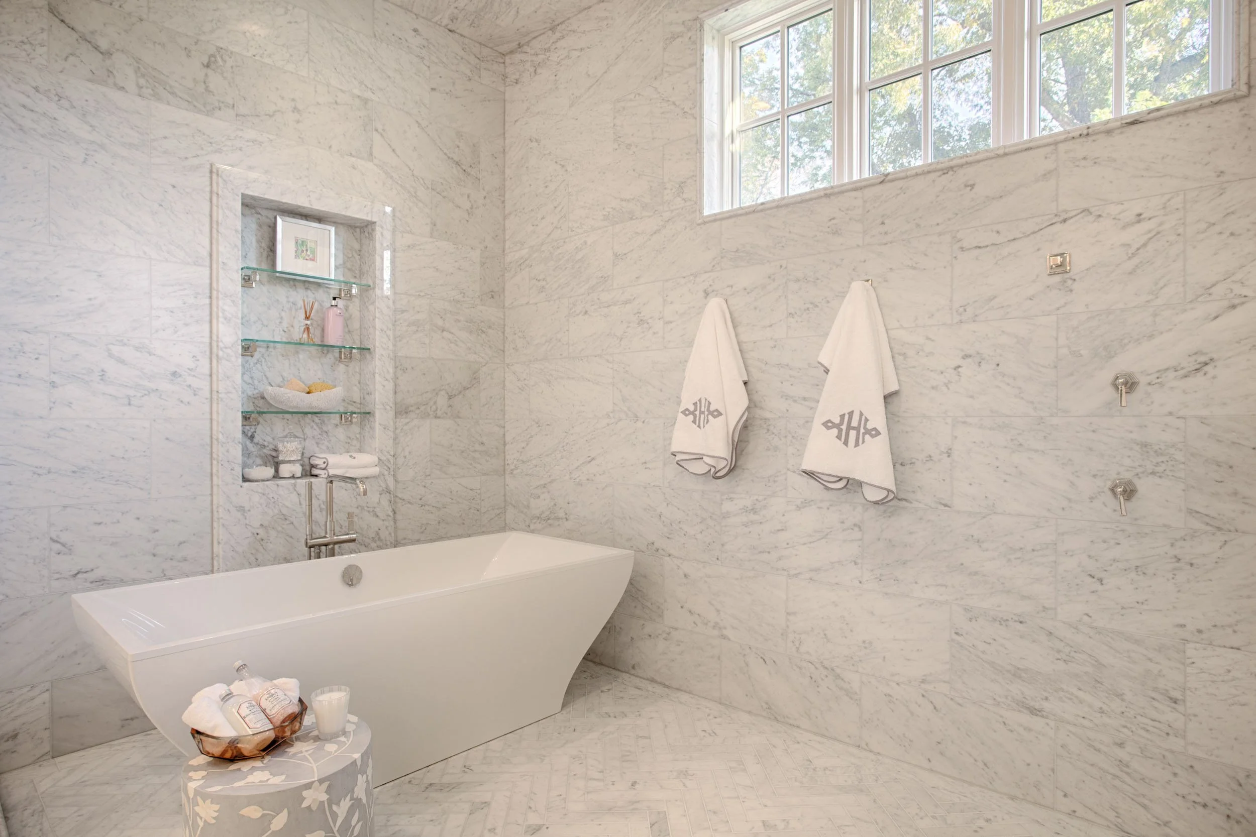  Custom tile by Young Brothers in OKC with white bathtub. 