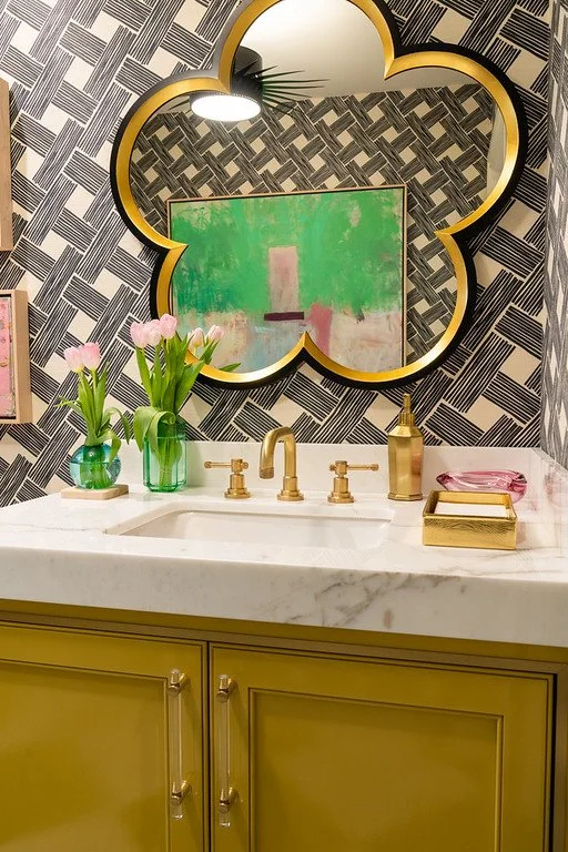  Custom countertops with wallpaper and gold accents.  