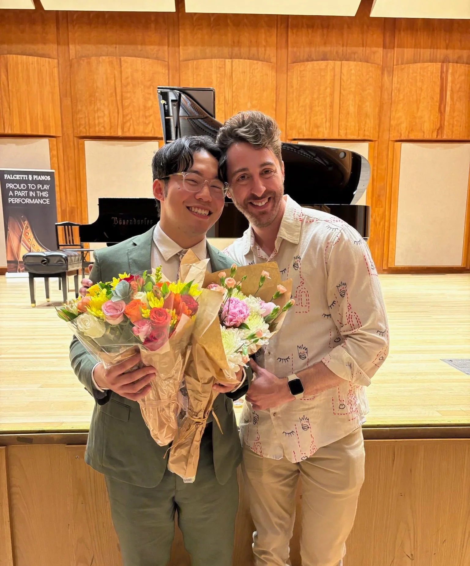 Jeff Li celebrates his winner's recital with flowers and Ryan
