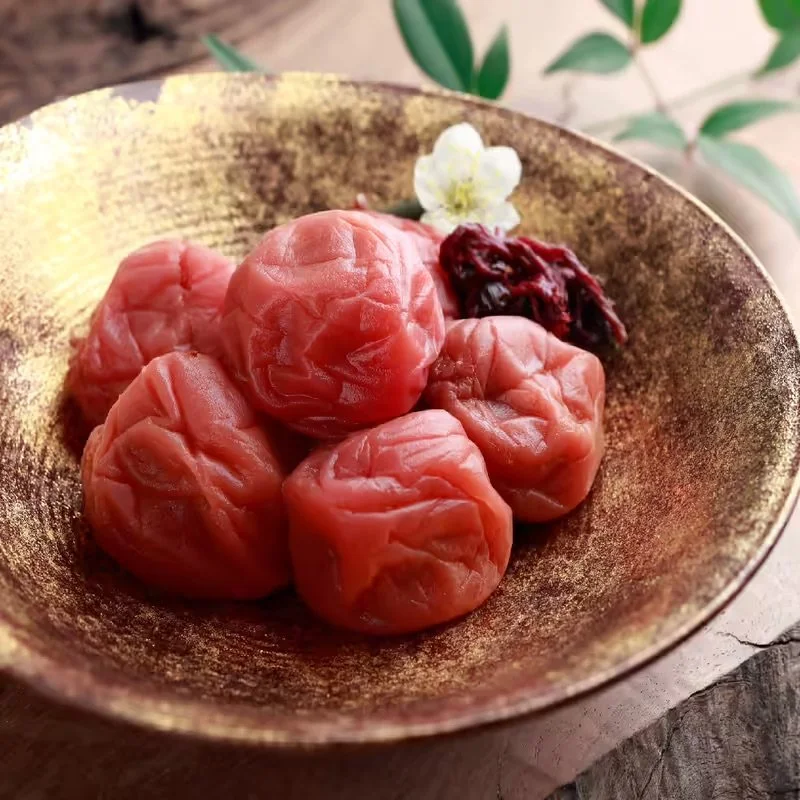 umeboshi on top of a golden dish
