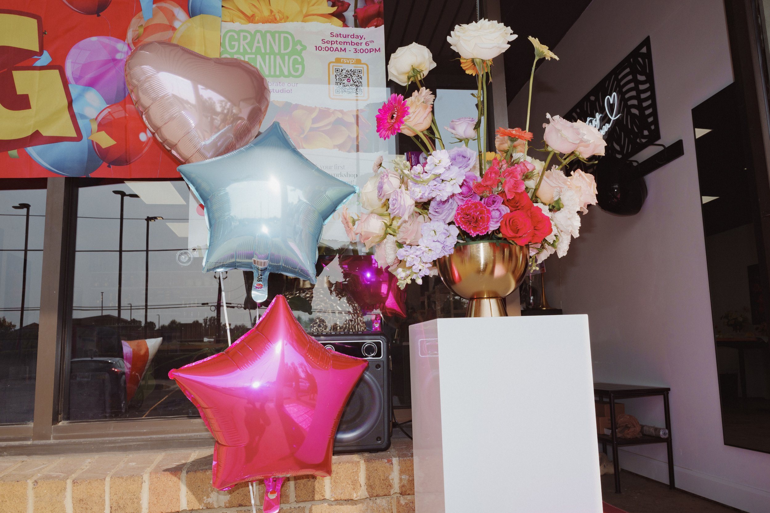 A fresh flower workshop class for a charitable fundraising event. Participants are learning how to arrange flowers and create beautiful bouquets. The proceeds from the event will benefit your charitable organization.